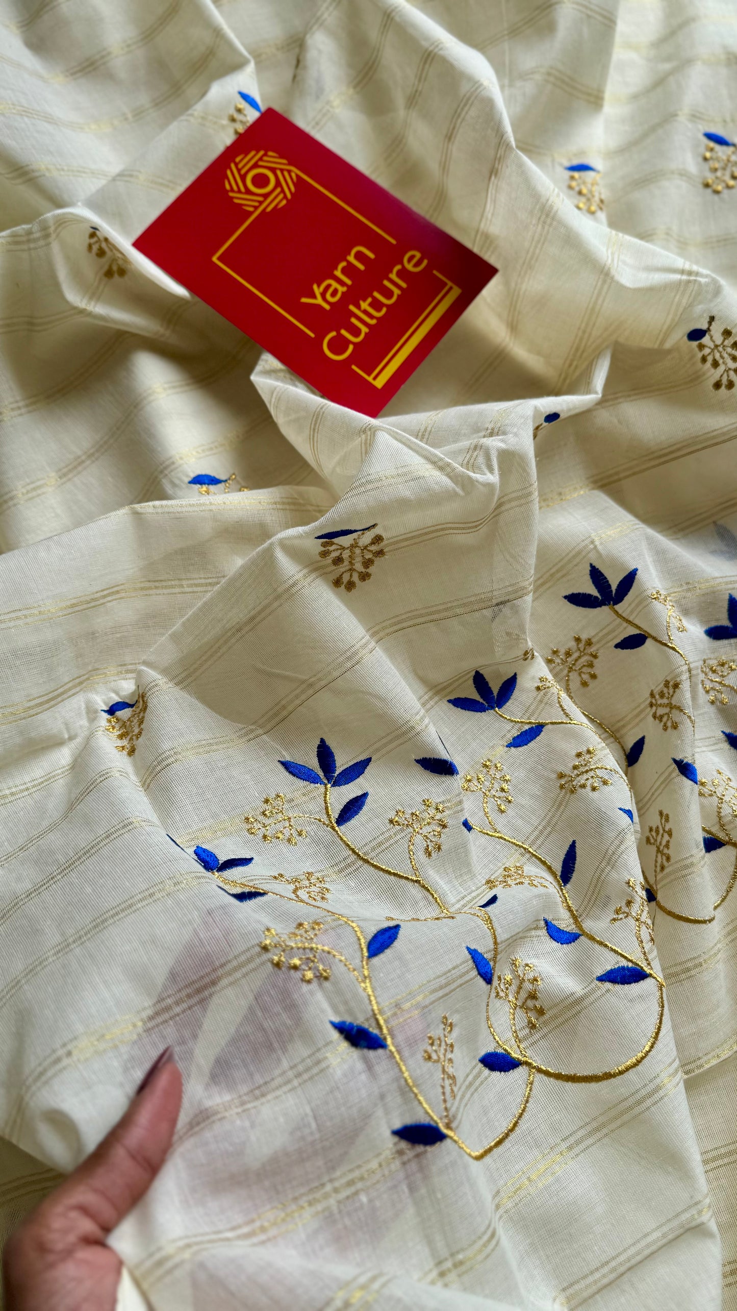 Ivory and gold soft cotton saree, blue floral vine embroidery  - YCIEON55