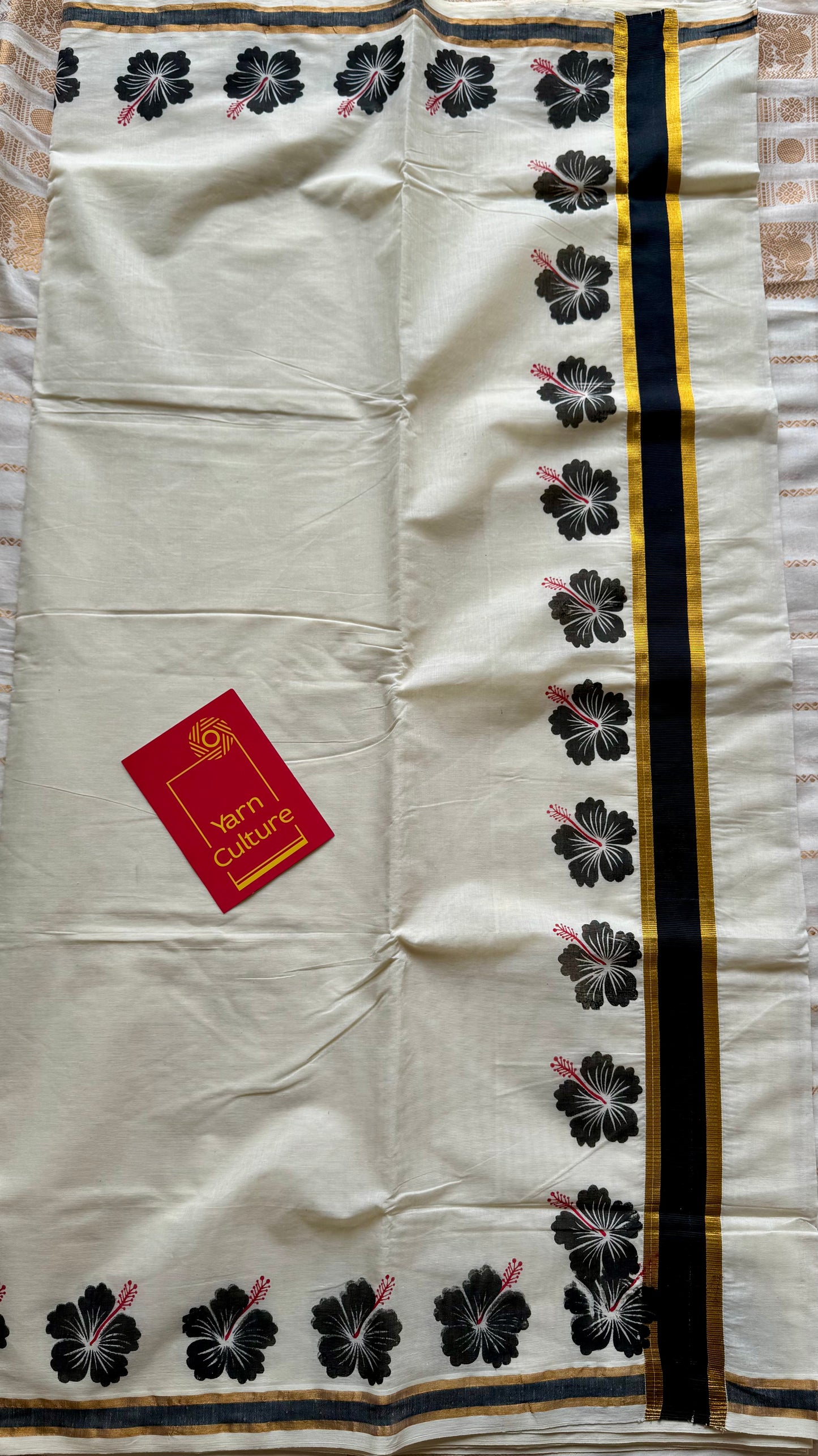 Ivory and gold soft cotton saree, black hibiscus (chembarathi) flowers - YCIEON61