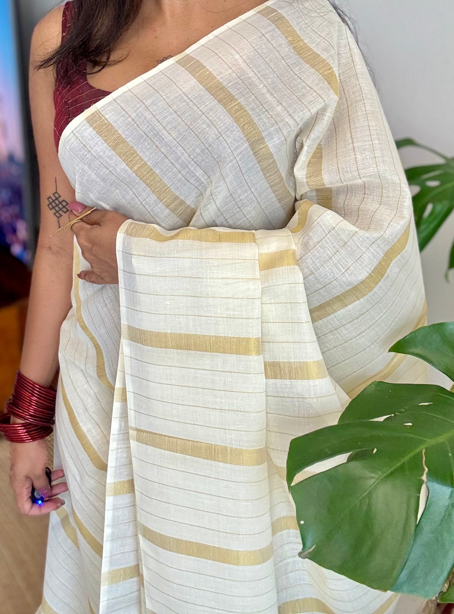 Ivory and gold kerala saree with gold stripes - YCIEON44