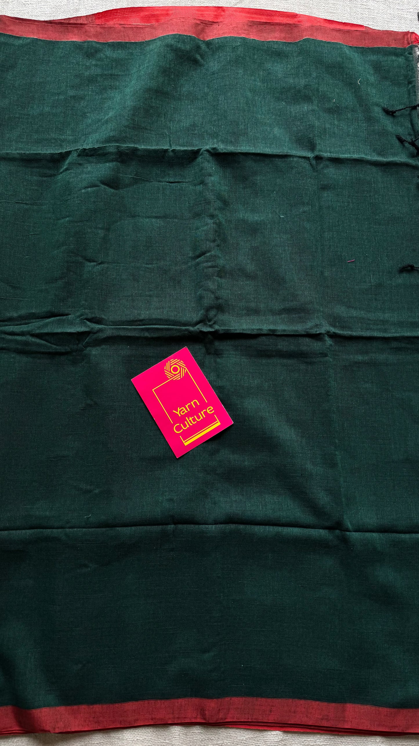 Dark green plain linen by cotton saree with copper zari pallu - YCBCLCFE397