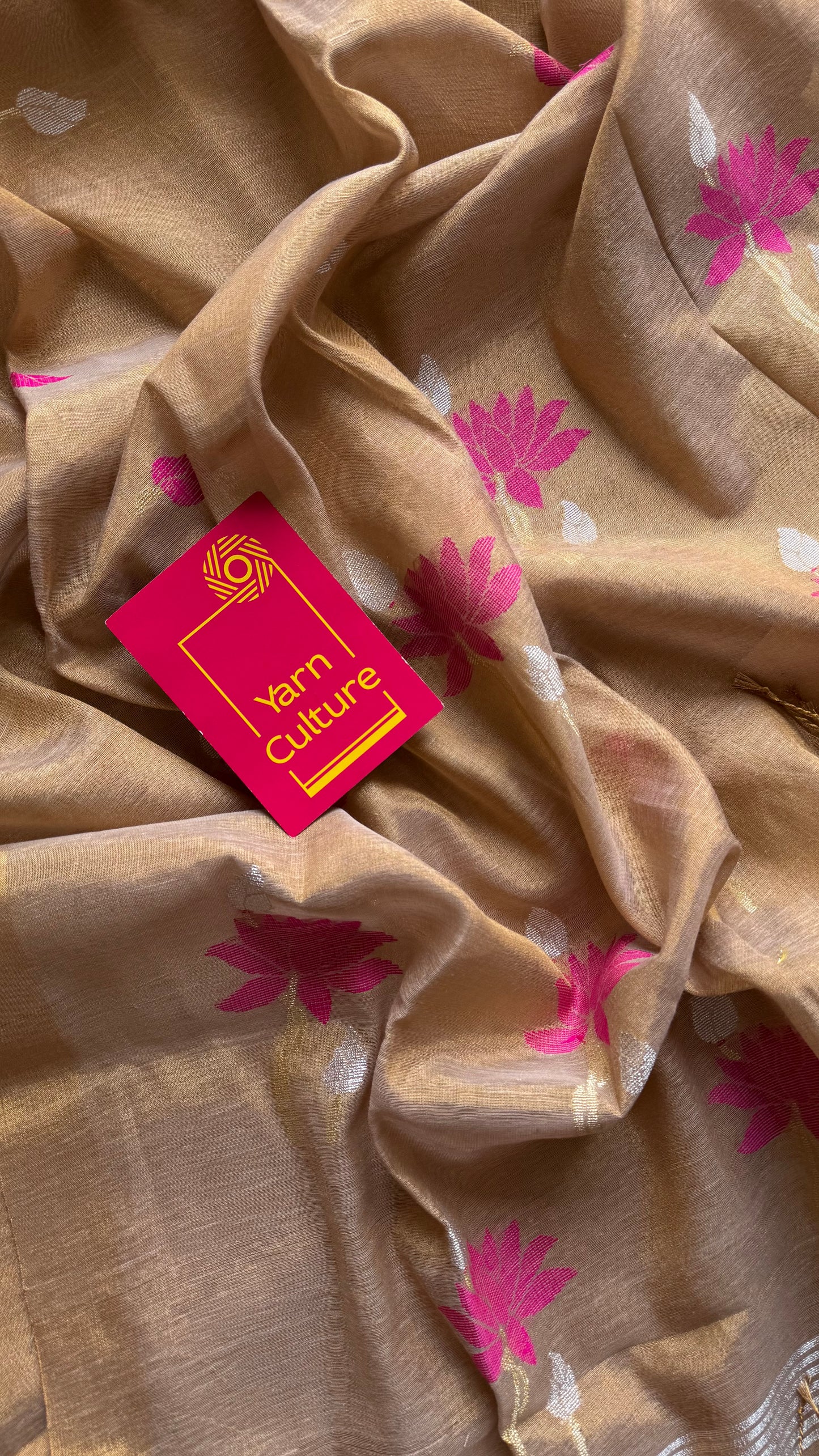 Handwoven ivory gold dual tone tissue linen saree with lotus motifs - YCBCLTFE400