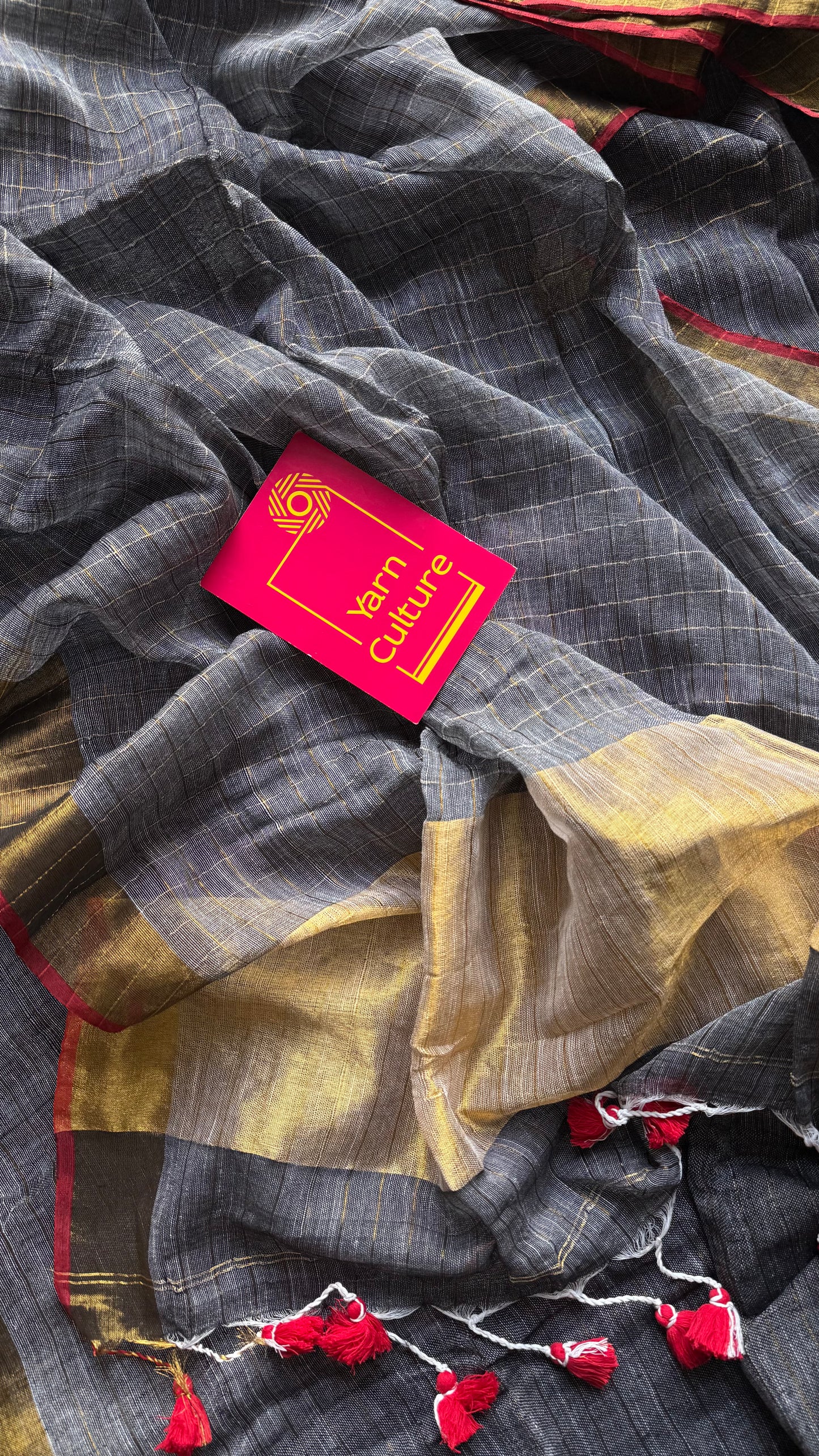 Grey linen by cotton saree, gold checks & gold zari pallu - YCBCLCFE388