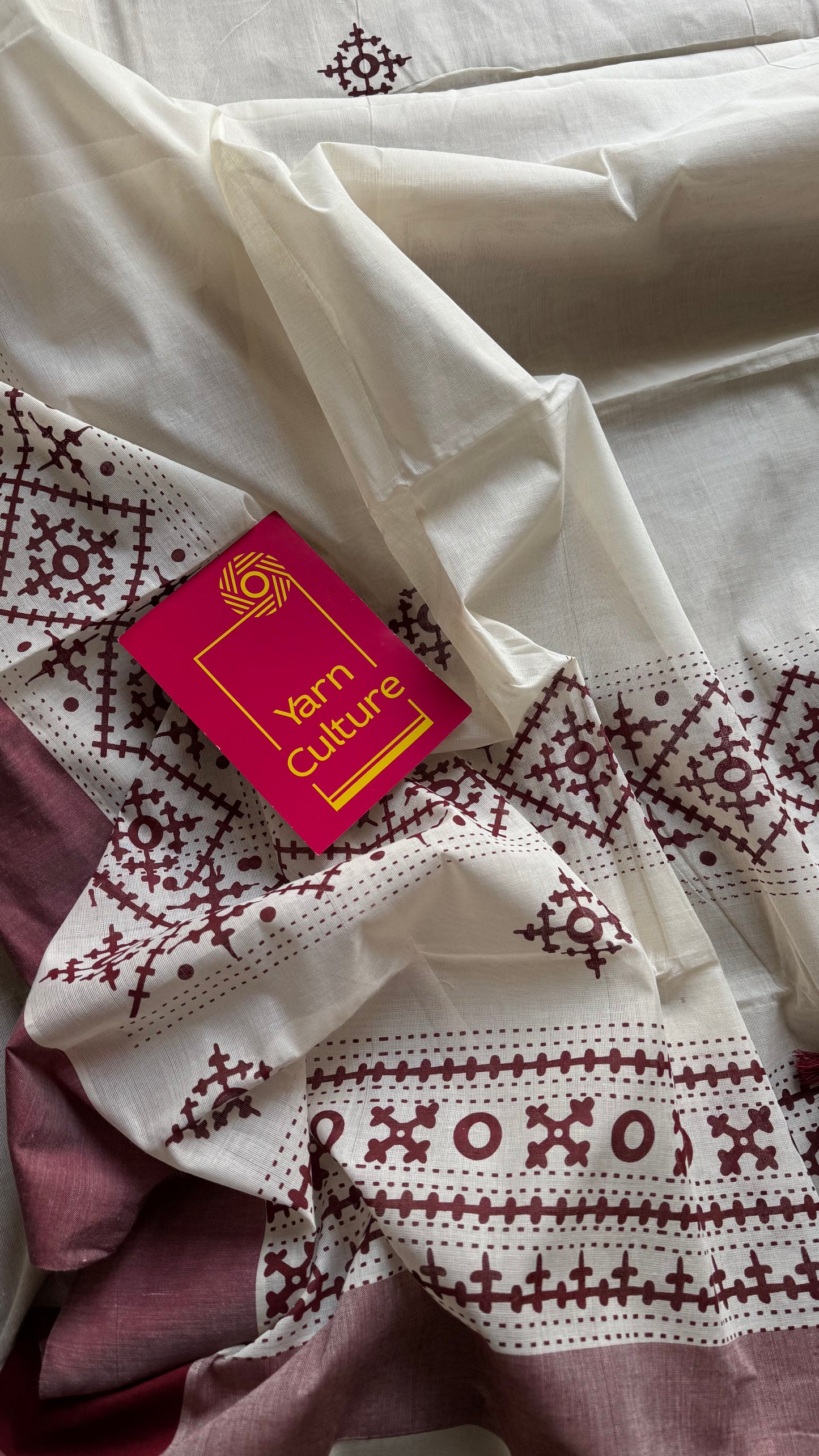Ivory Kerala cotton saree with maroon Kutch-inspired printed borders and maroon centre pleats - YCIEKCFE313