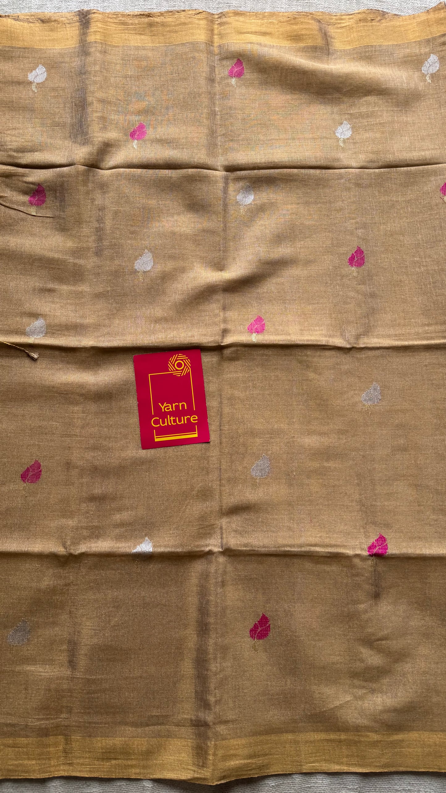 Handwoven ivory gold dual tone tissue linen saree with lotus motifs - YCBCLTFE400
