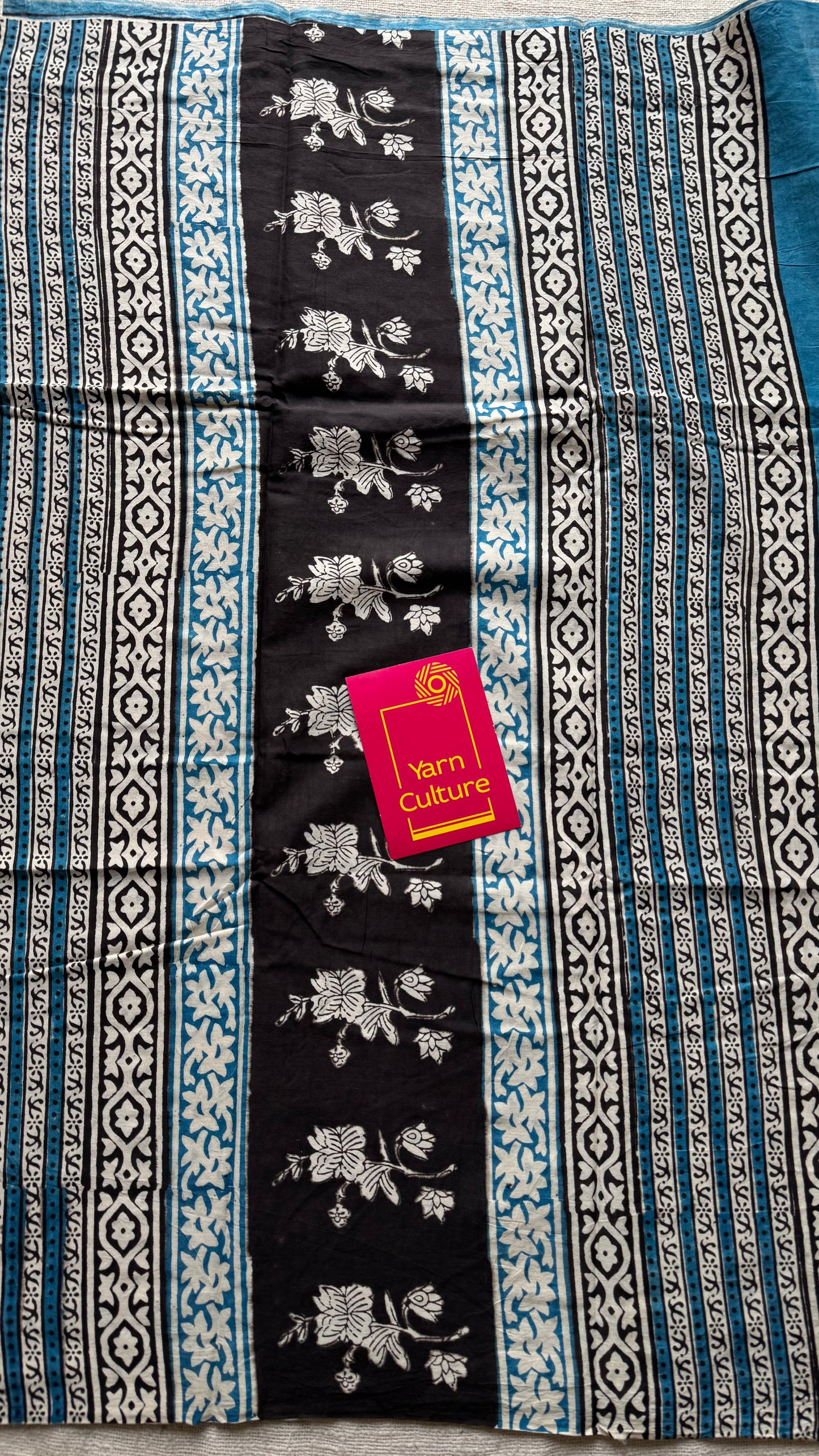 Beige with grey flowers, blue border, block printed soft cotton saree - YCTORCMA14