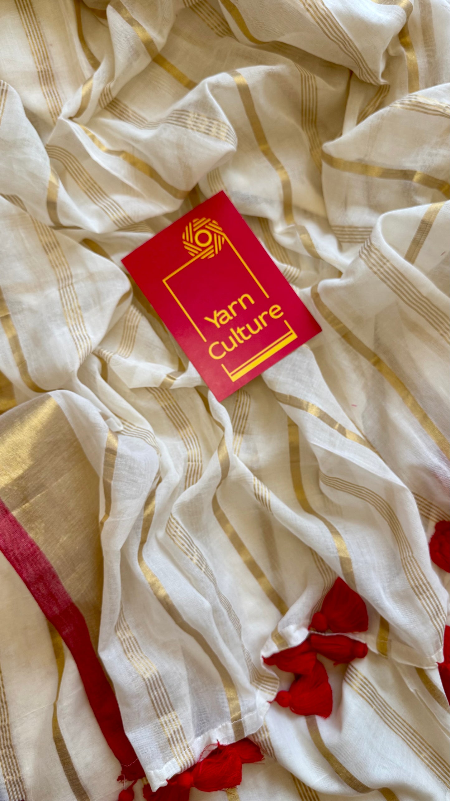 Ivory mul saree, gold stripes with red border - YCIEON04
