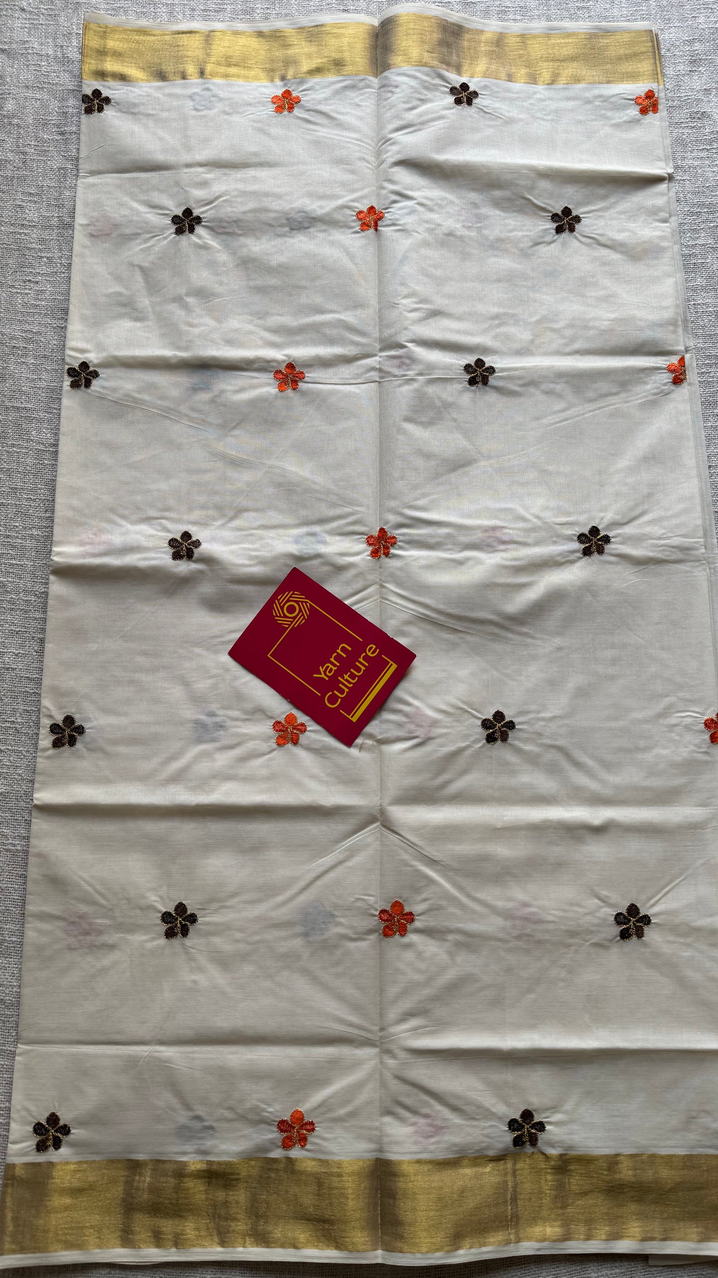 Ivory and gold saree with brown and orange floral embroidery - YCIEKCFE311