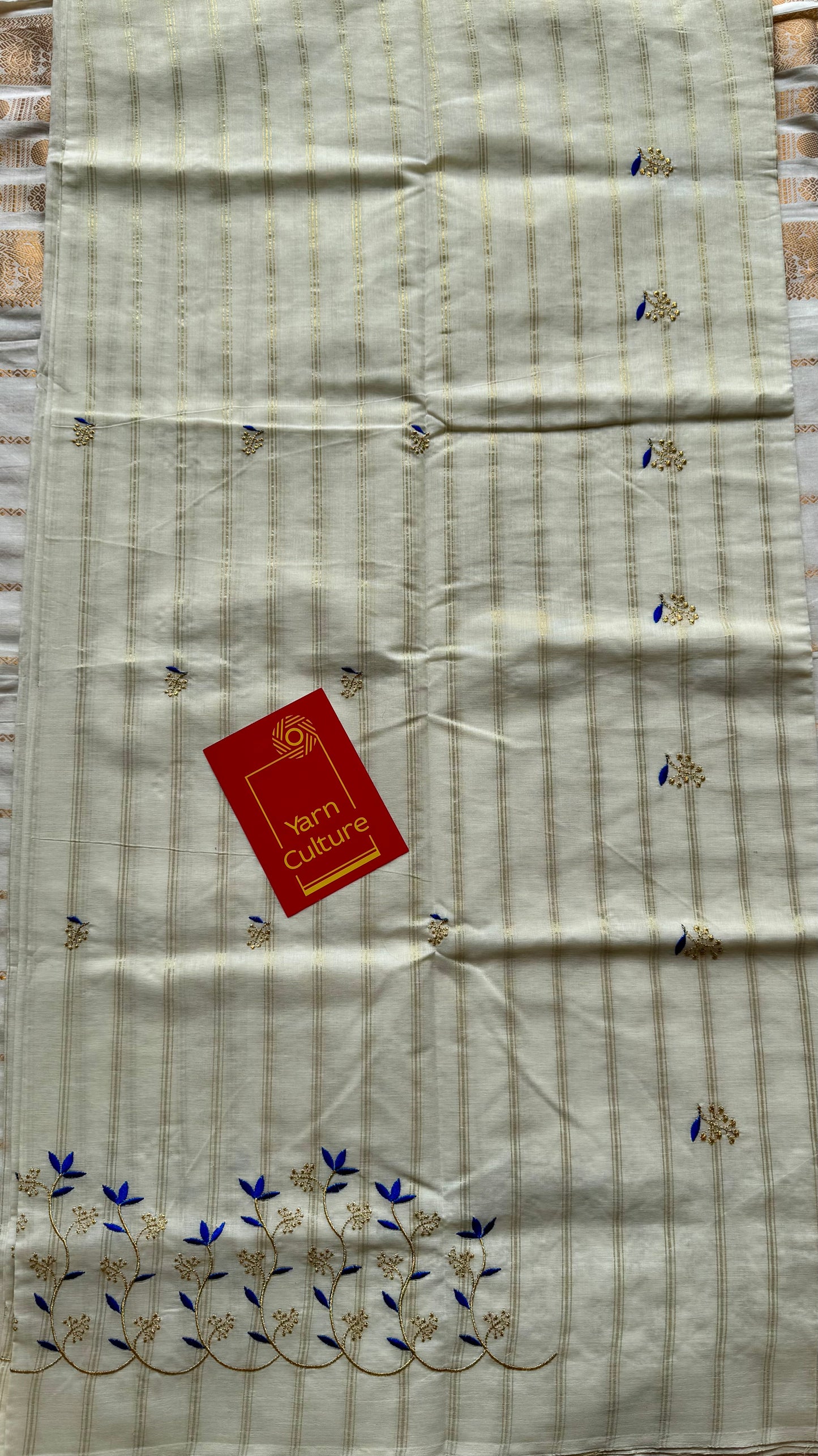 Ivory and gold soft cotton saree, blue floral vine embroidery  - YCIEON55