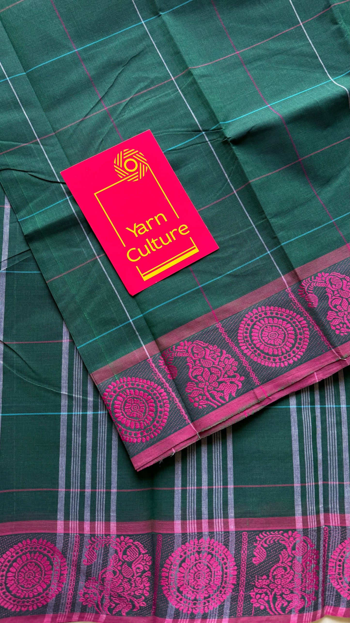 Chettinad cotton saree in dark green with pink checks, thread motif border - YCCOTNJUCC05