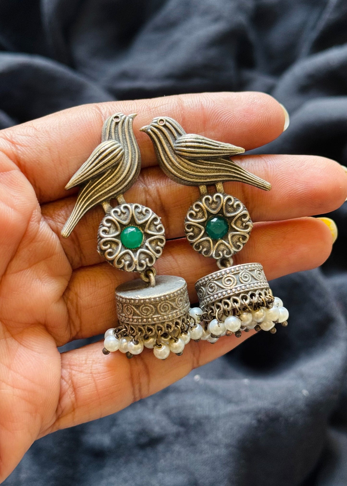 Bird Jhumka, green stone, black polished oxidised silver - YCOSEJ449