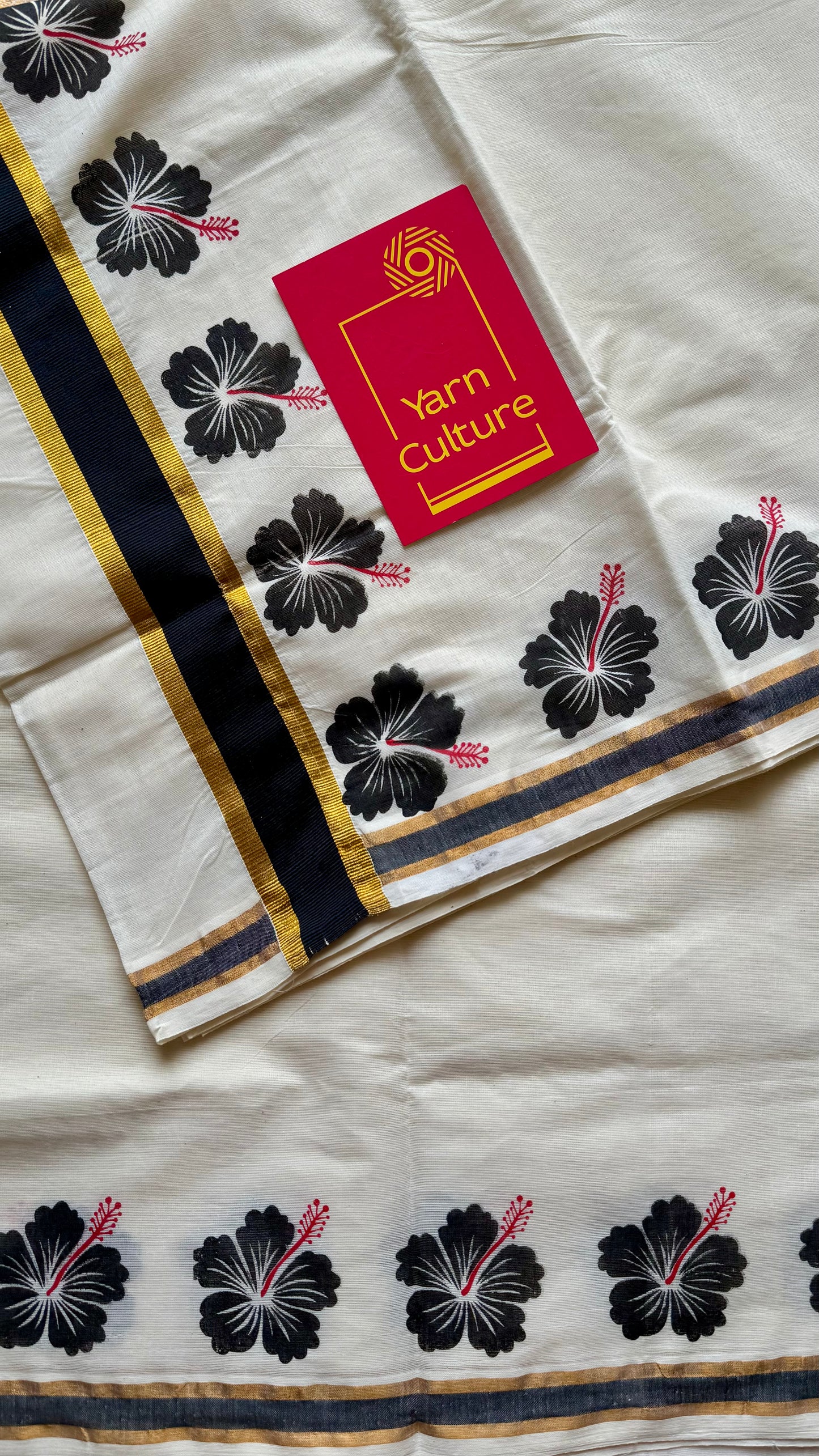 Ivory and gold soft cotton saree, black hibiscus (chembarathi) flowers - YCIEON61