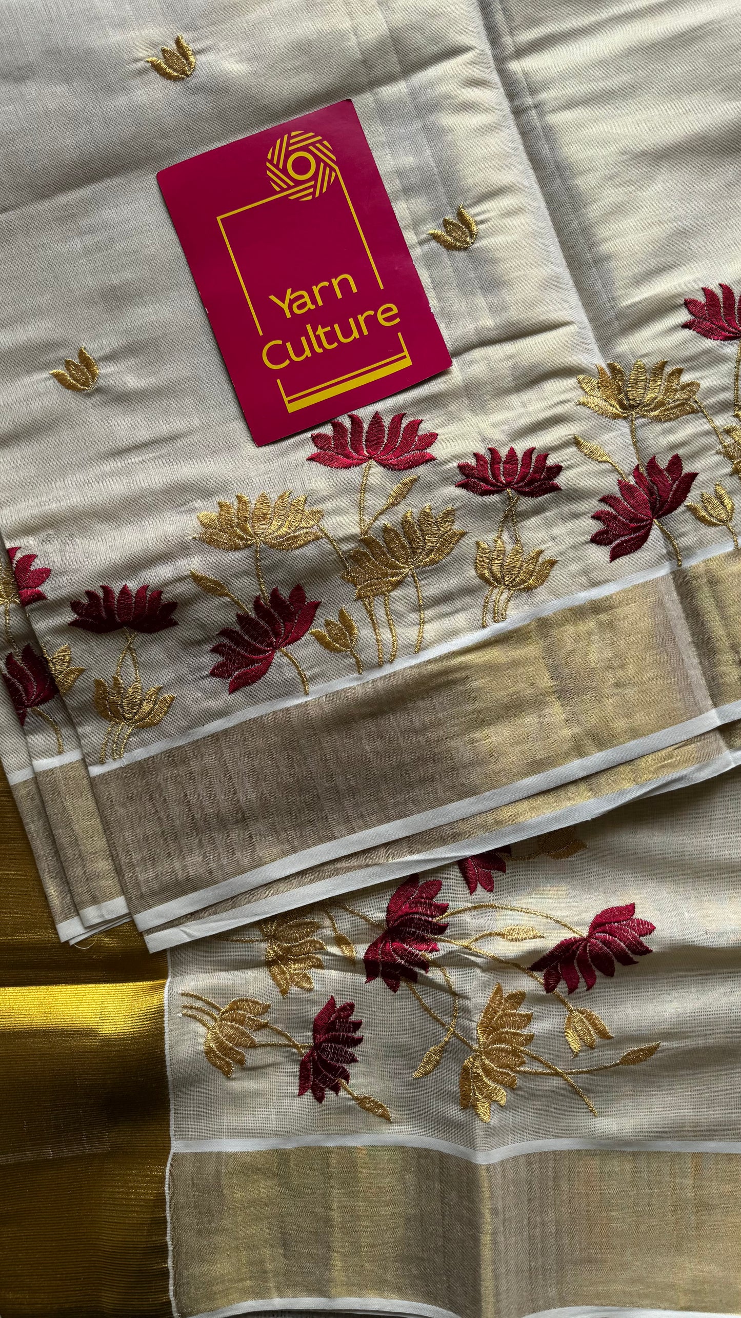 Ivory and gold tissue kerala cotton saree with maroon and gold lotus embroidery - YCIEKCFE316