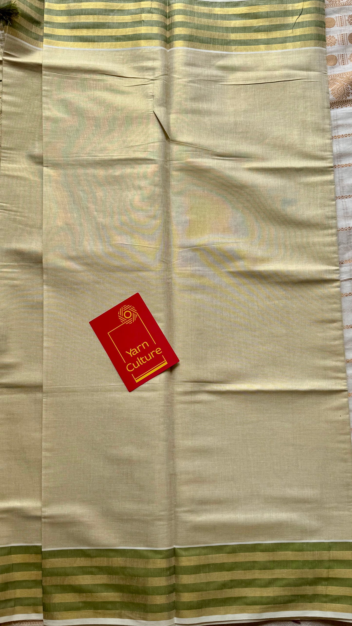Ivory and gold soft tissue cotton saree, light green border - YCIEON65