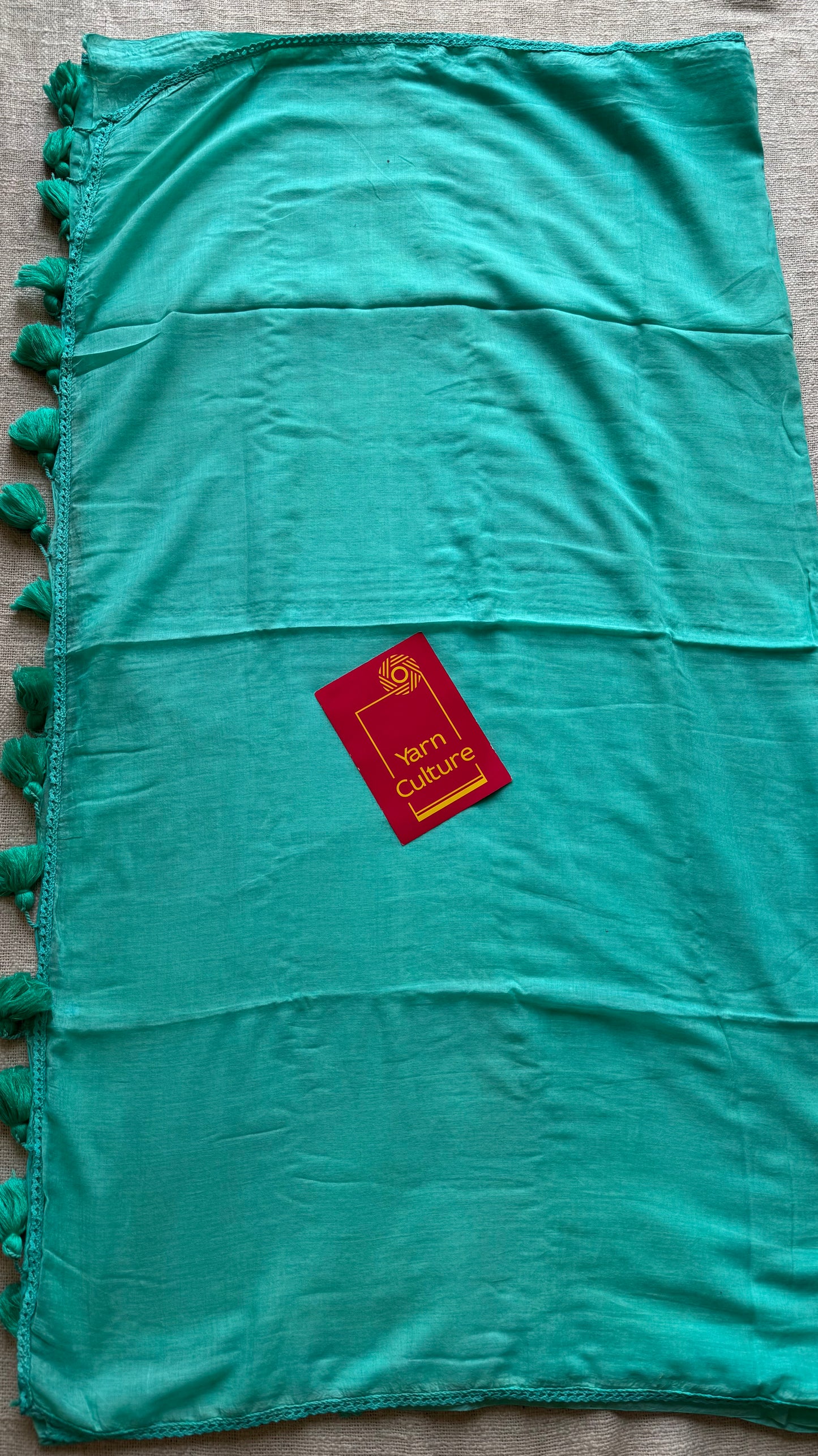 Turquoise plain mul saree with lace border - YCBCMCFE403
