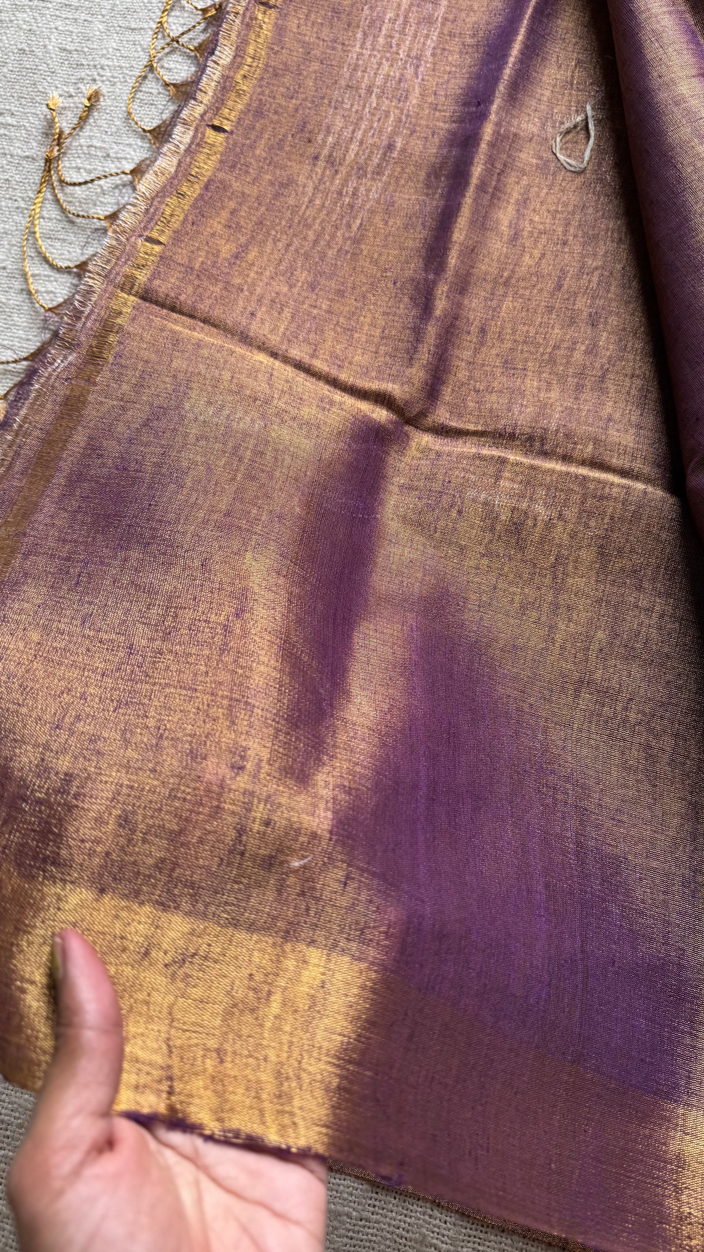 Handwoven purple gold dual tone tissue linen saree with lotus motifs - YCBCLTFE401