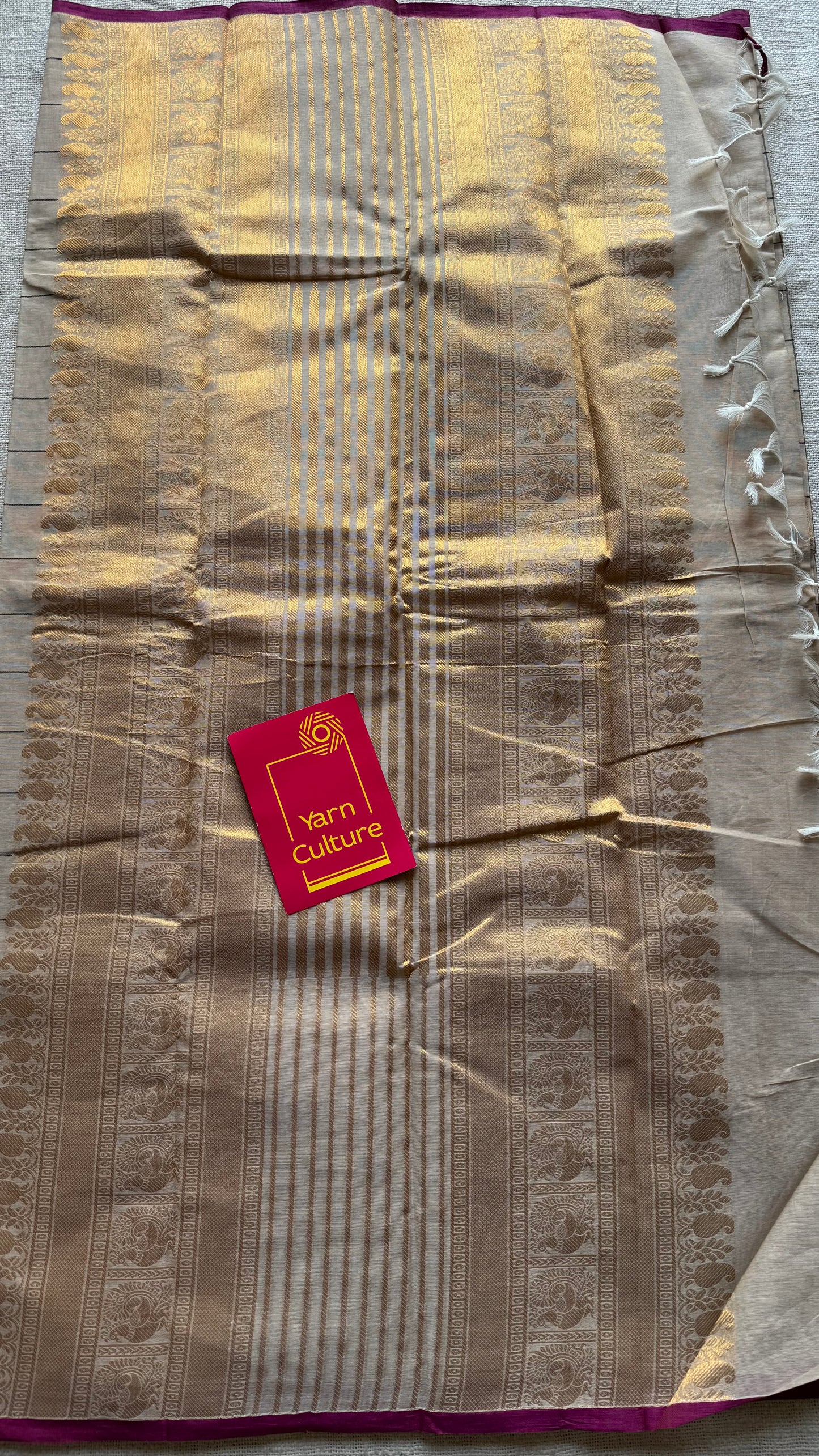 Cream dual tone checks with peacock motifs, kanchi cotton saree - YCCOTNKCFE339