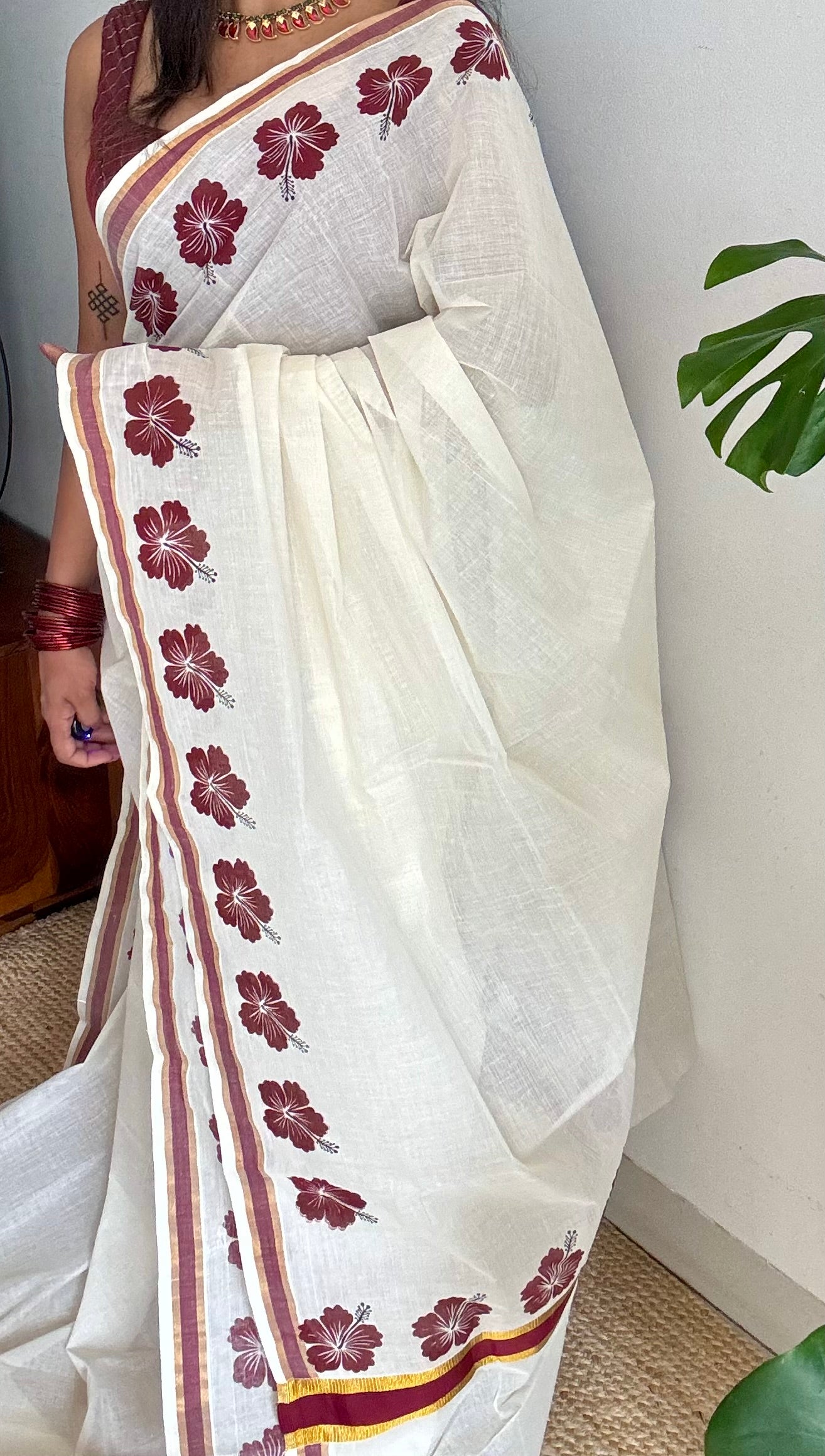 Ivory and gold soft cotton saree, maroon hibiscus (chembarathi) flowers - YCIEON62