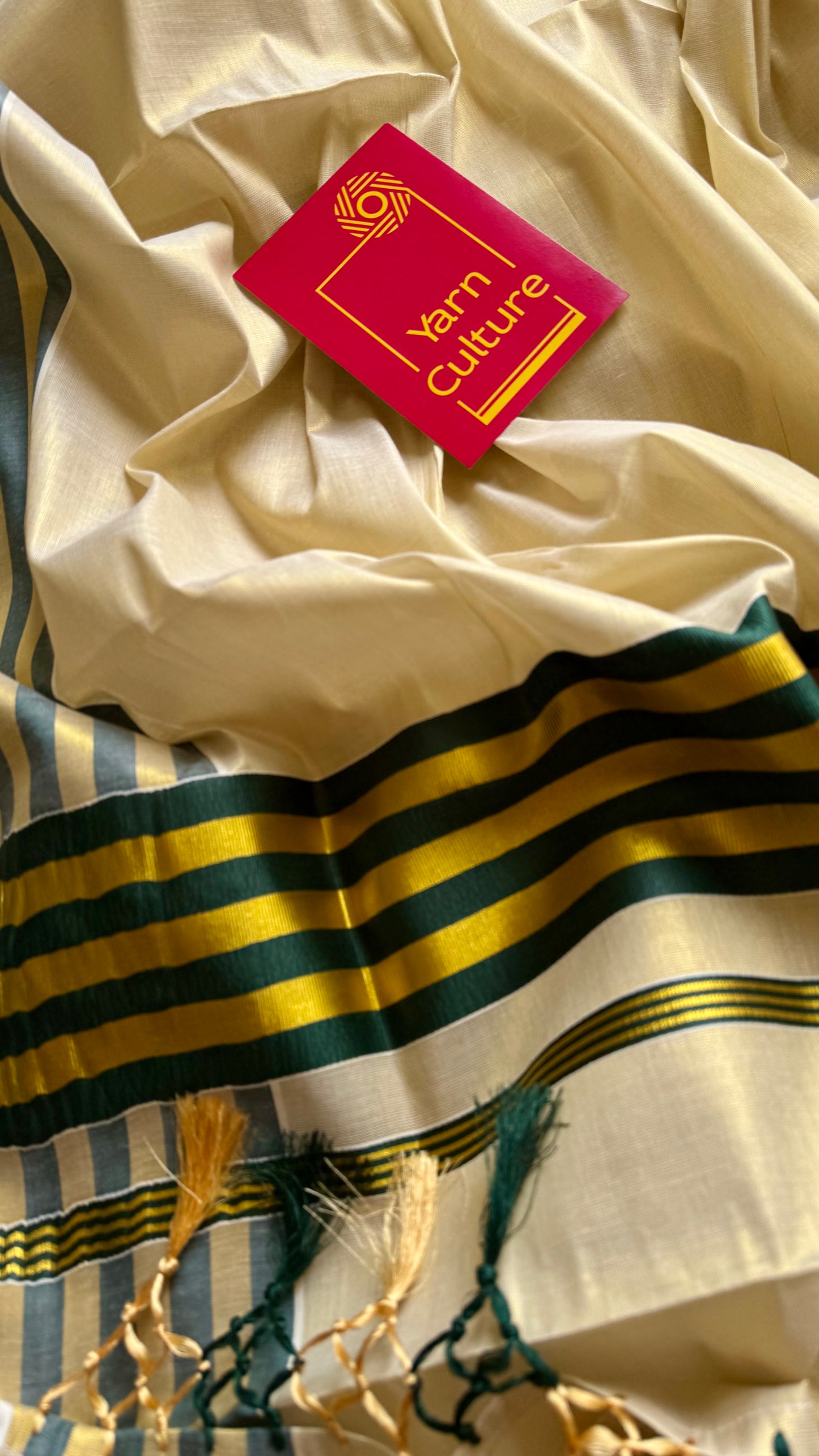 Ivory and gold soft tissue cotton saree, dark green border - YCIEON68