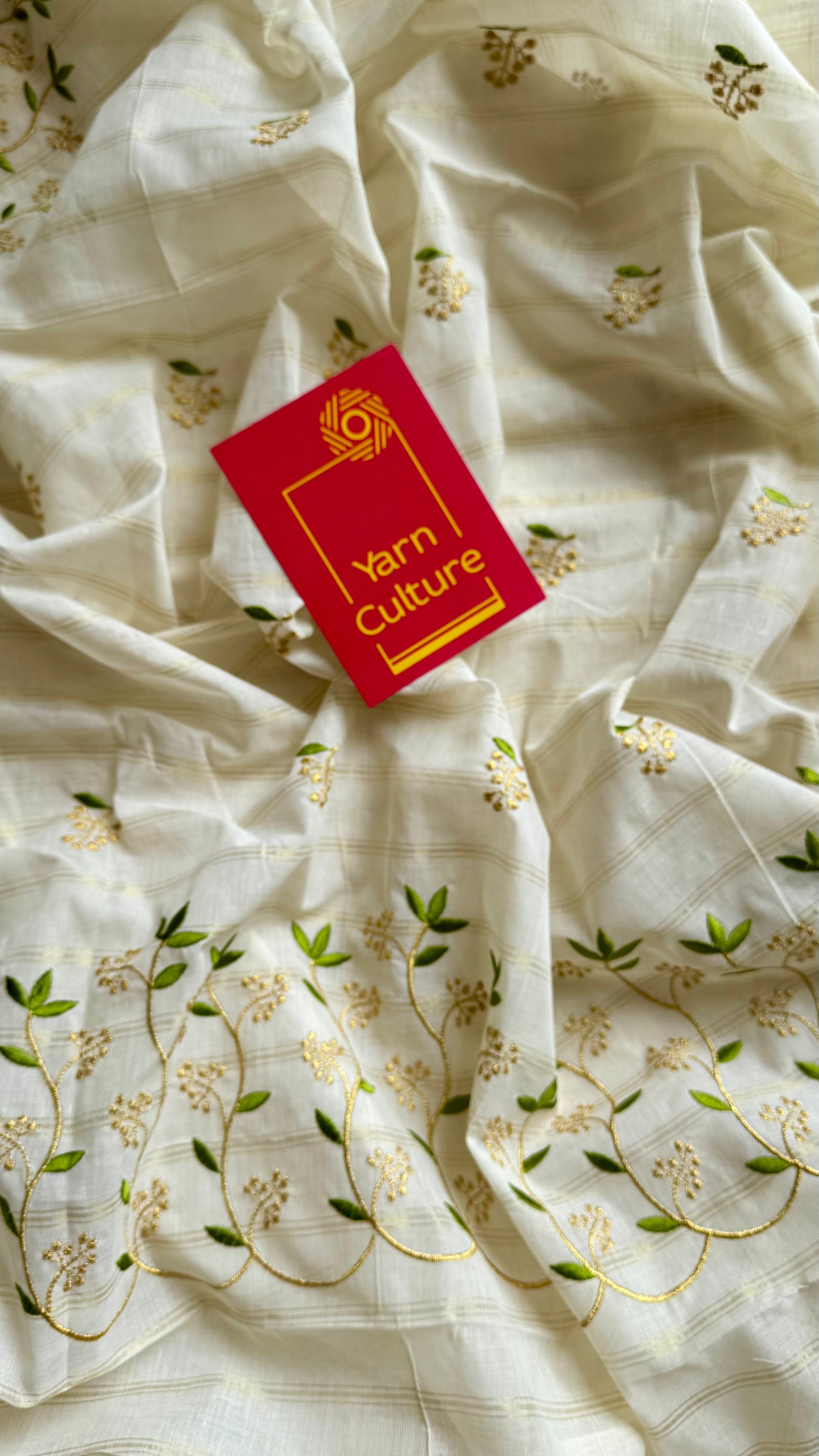 Ivory and gold soft cotton saree, light green floral vine embroidery - YCIEON59