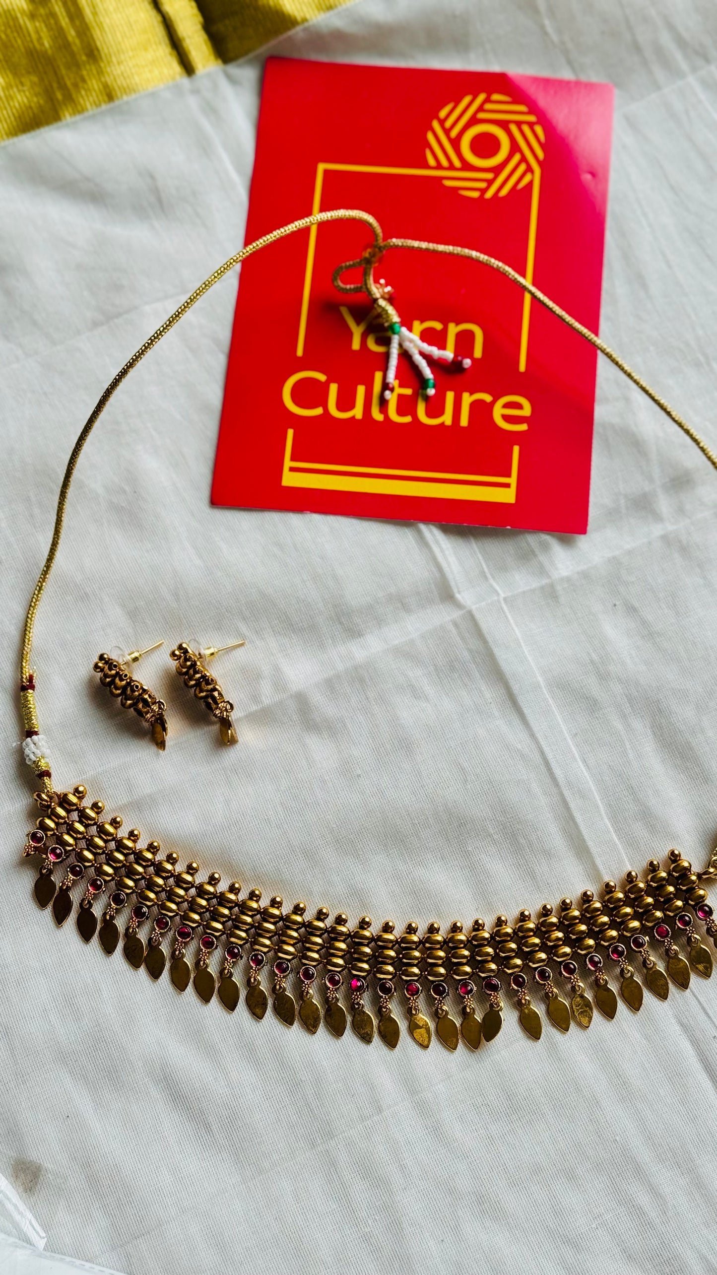 Elakkathali with ruby stones, with earrings - YCGPNP791