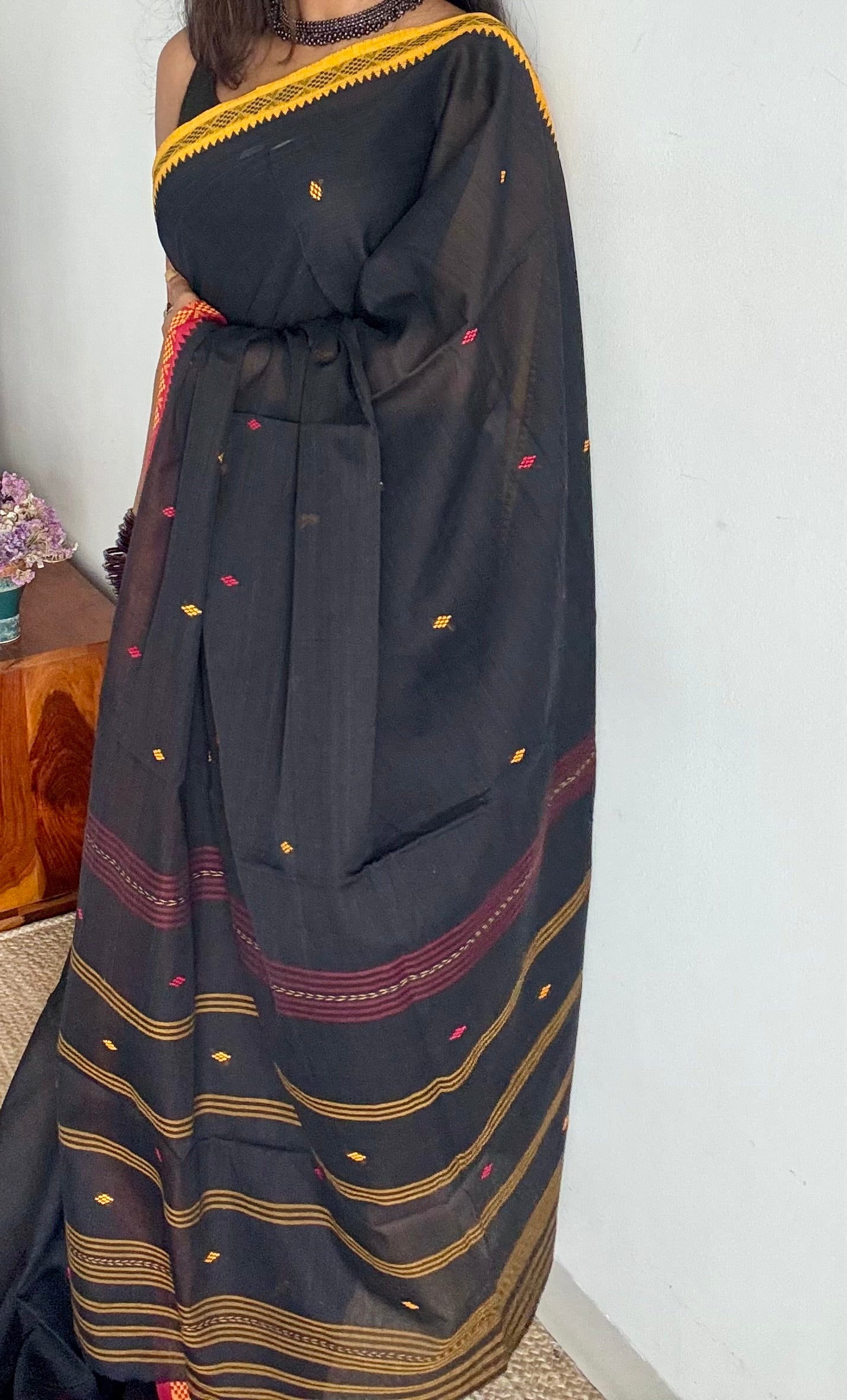 Dhonekhali handloom soft cotton saree, black with red and yellow woven buttas and border - YCBCDFE259