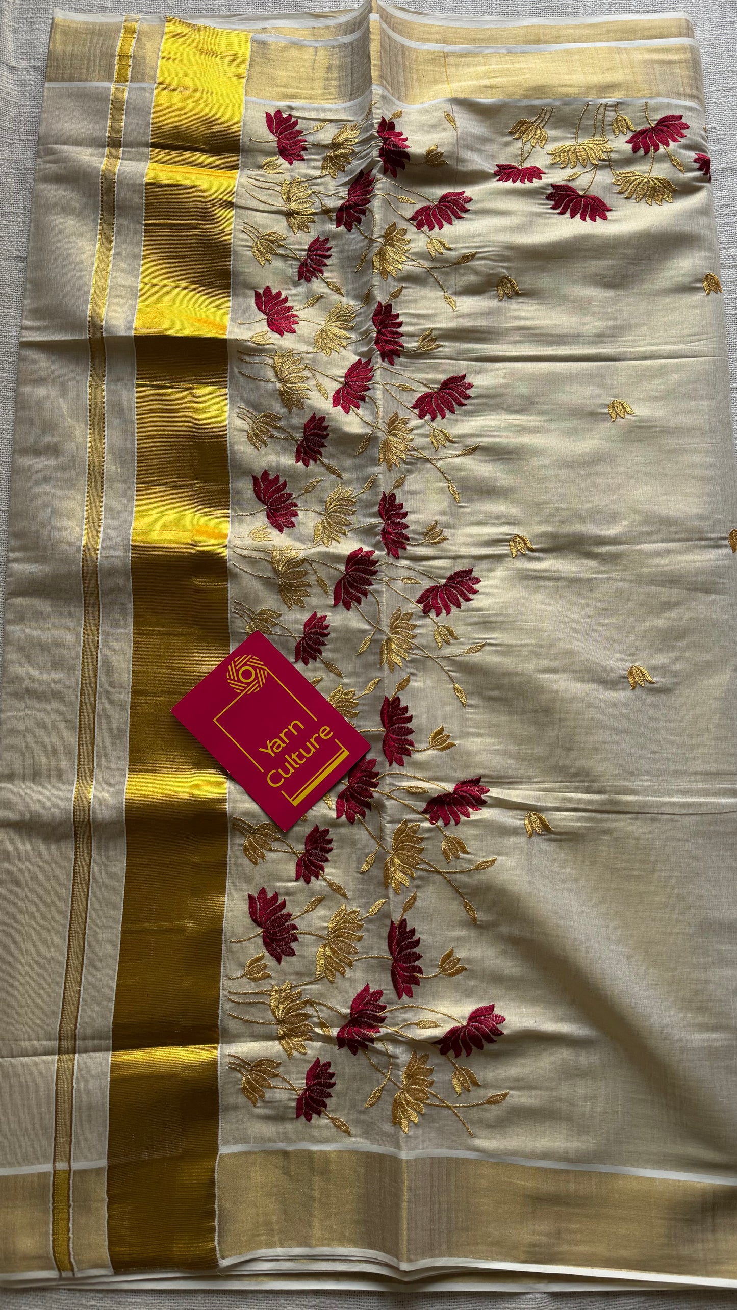 Ivory and gold tissue kerala cotton saree with maroon and gold lotus embroidery - YCIEKCFE316
