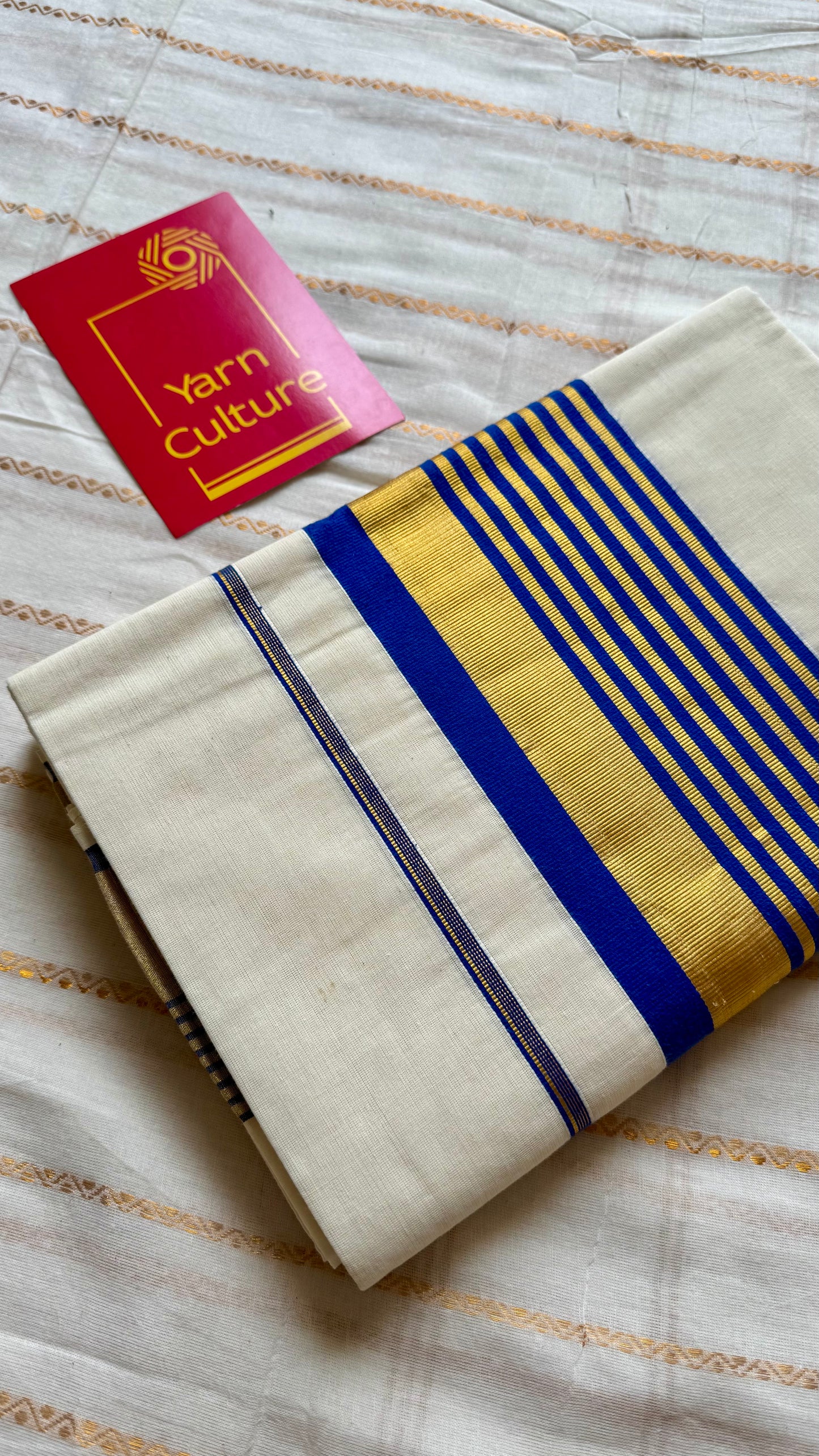 Ivory and gold soft cotton saree, royal blue border - YCIEON77