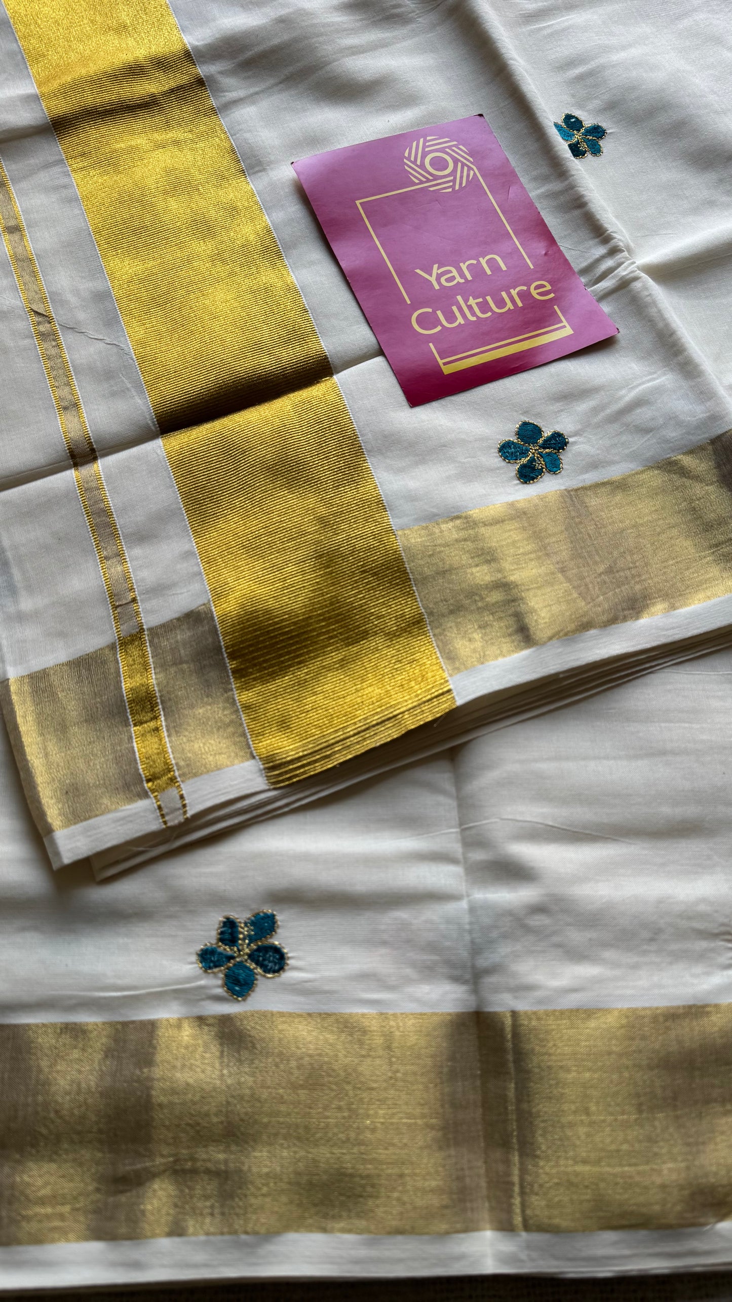 Ivory and gold saree with peacock blue and yellow floral embroidery - YCIEKCFE309