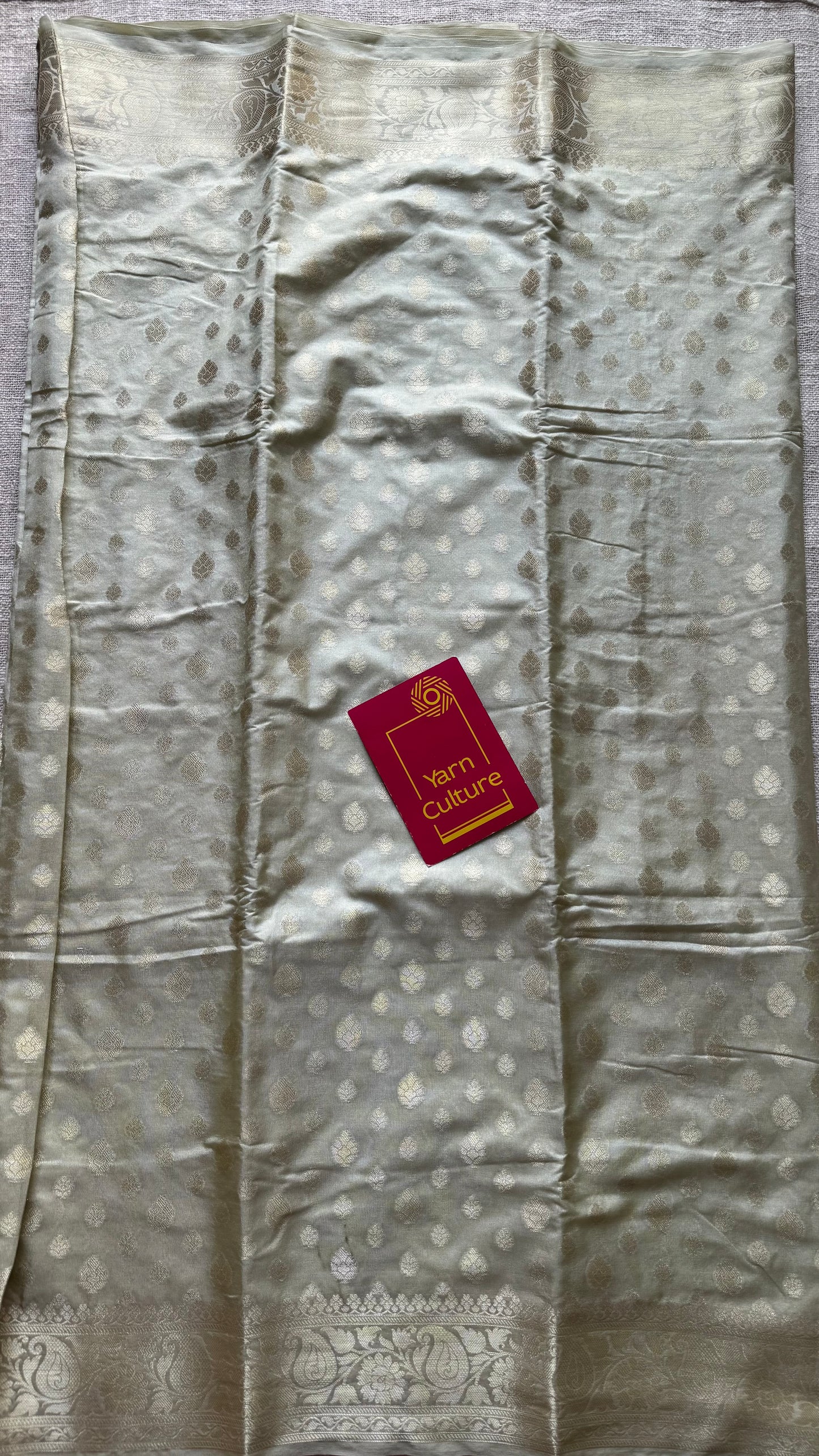 Pastel cream, muted gold buttas and zari, Banarasi semi-silk - YCDESE33