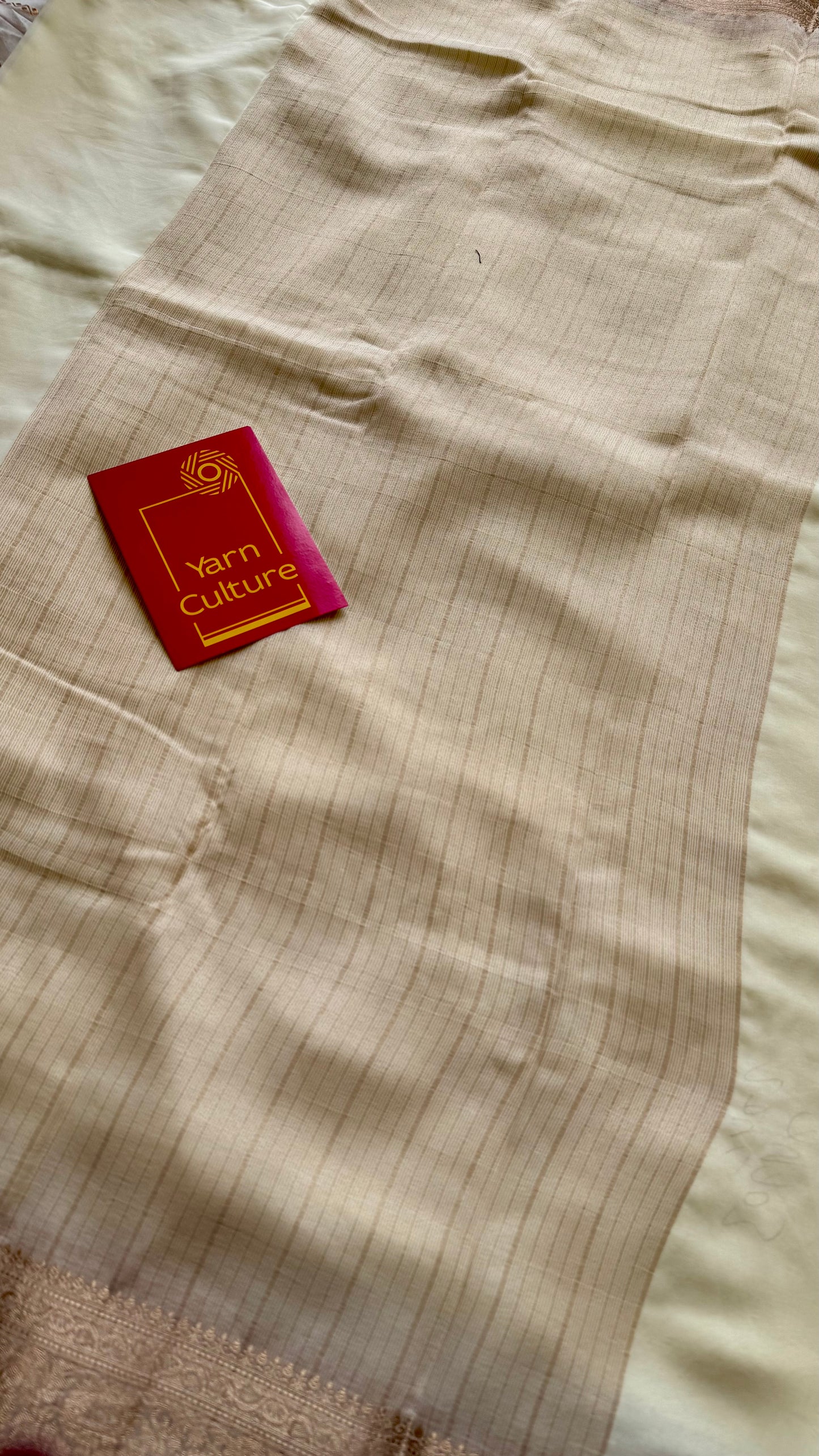 Ivory soft georgette saree, with antique gold zari border - YCIEON87