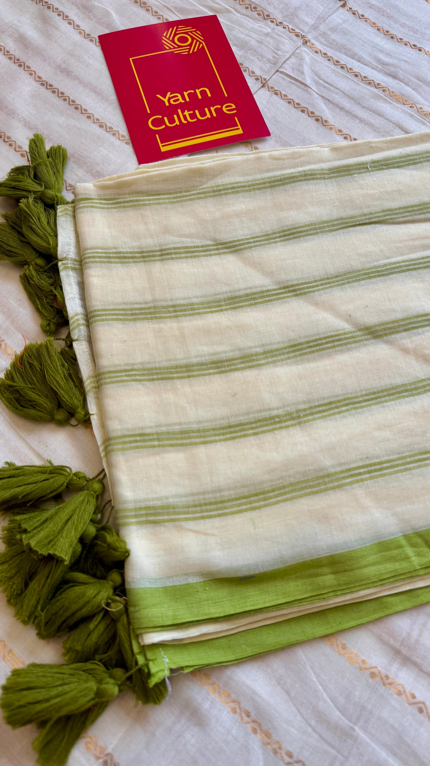 Ivory mul saree, green stripes - YCIEON23
