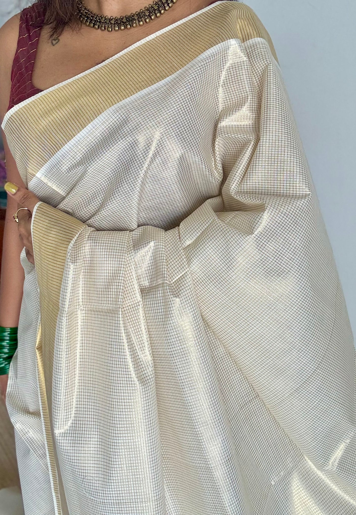 Ivory Kerala tissue cotton saree with gold microchecks - YCIEKCFE317