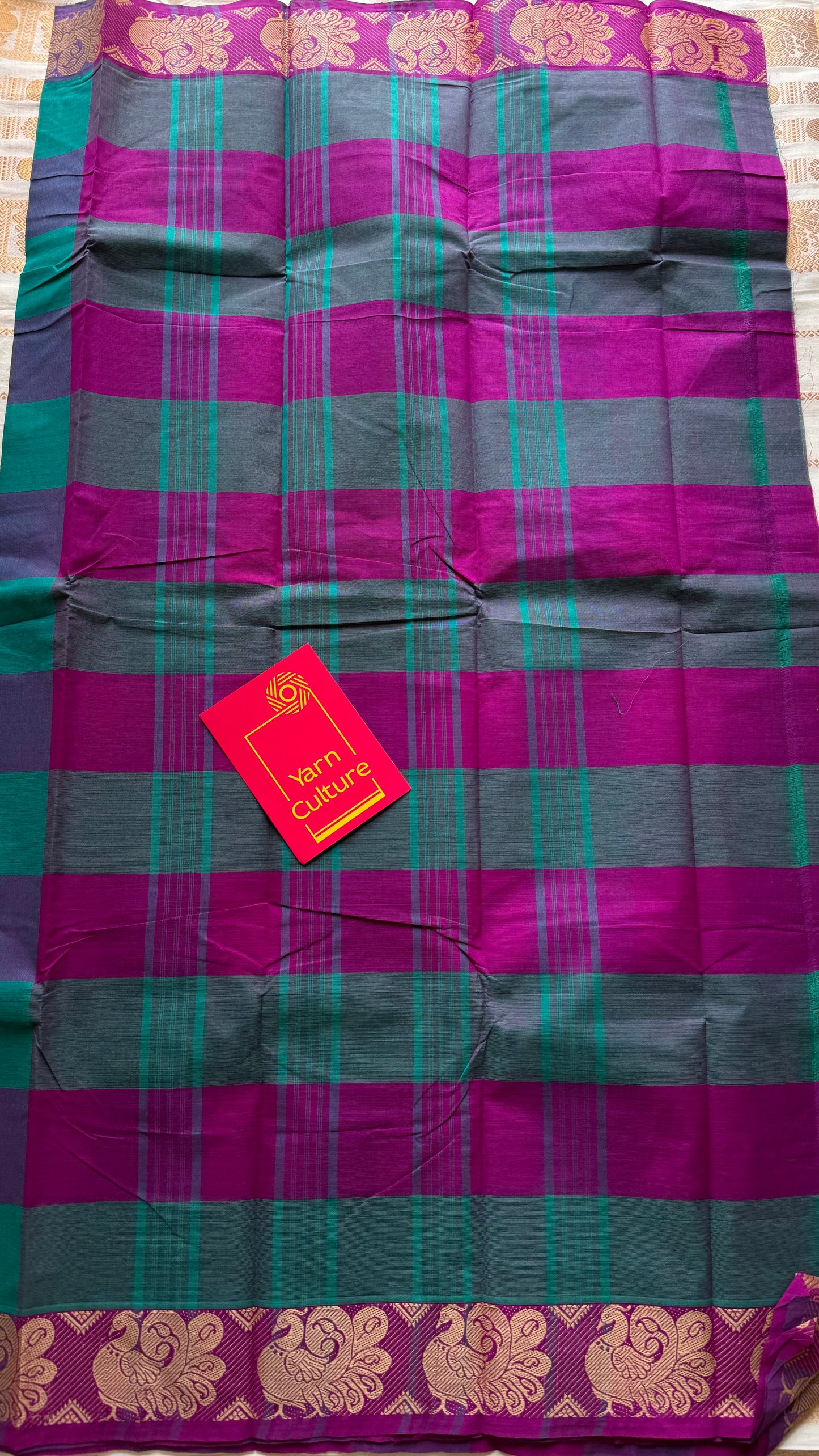 Chettinad cotton saree with magenta and cyan checks, peacock motif border - YCCOTNJUCC03