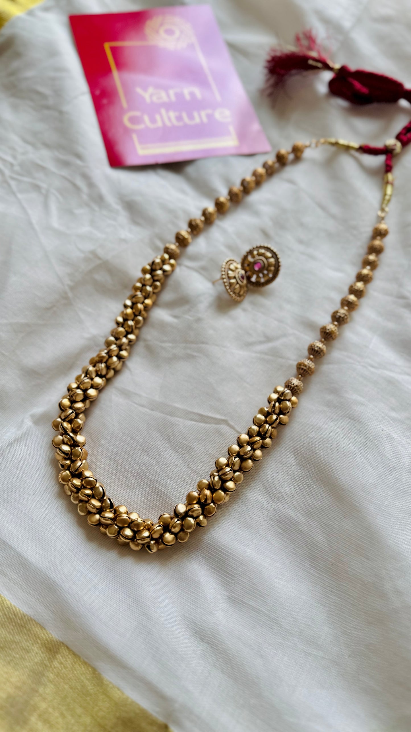 Long ghungroo beaded neckpiece, with earrings - YCOSGNP721