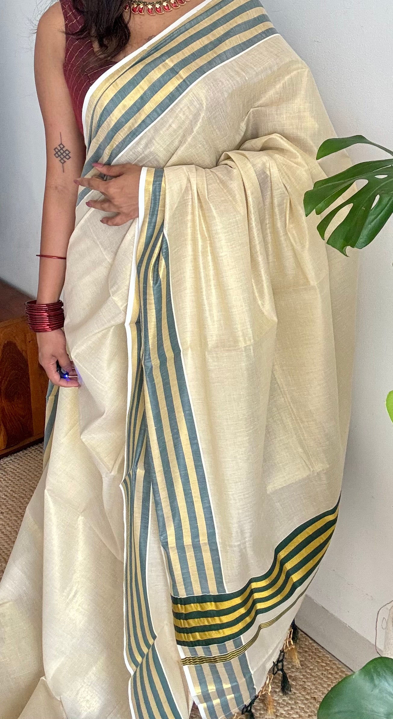 Ivory and gold soft tissue cotton saree, dark green border - YCIEON68