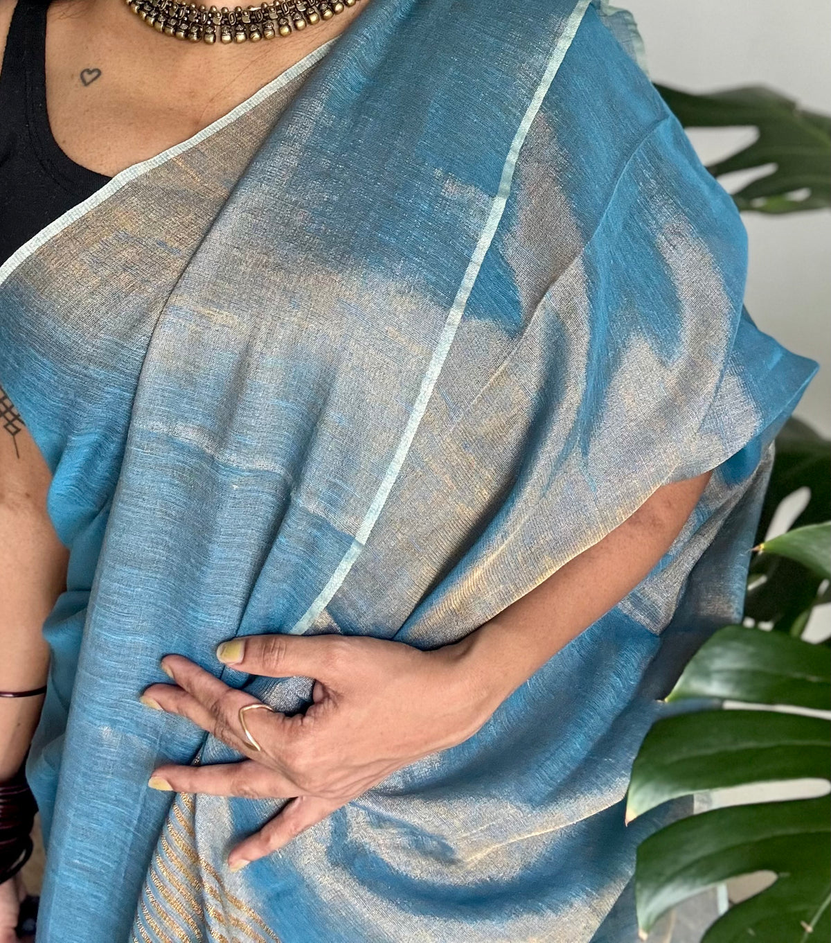 Teal blue with gold, dual tone metallic tissue linen saree - YCBCLTOC59