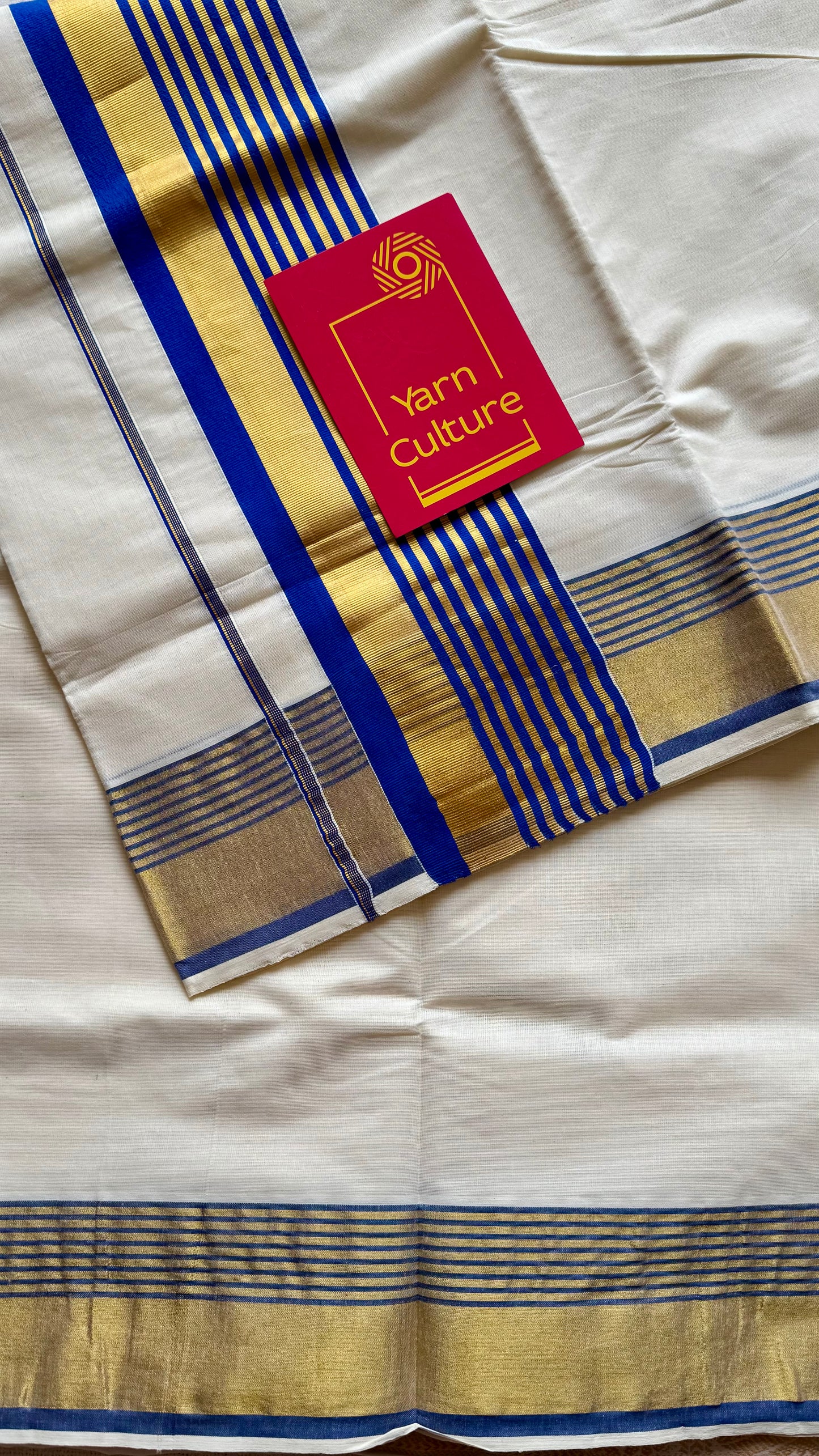 Ivory and gold soft cotton saree, royal blue border - YCIEON77