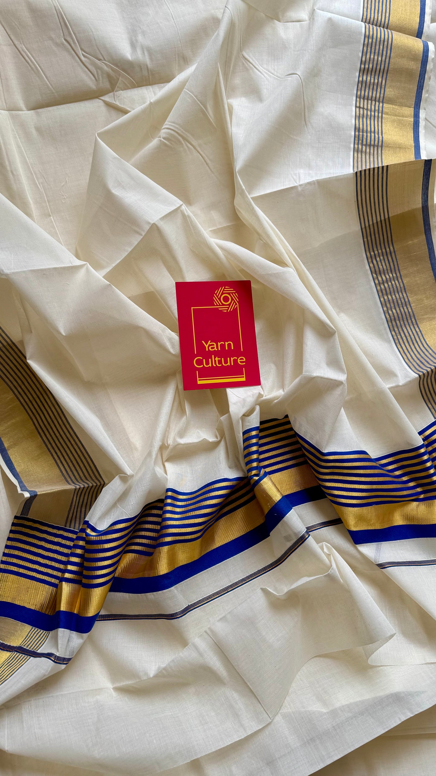 Ivory and gold soft cotton saree, royal blue border - YCIEON77