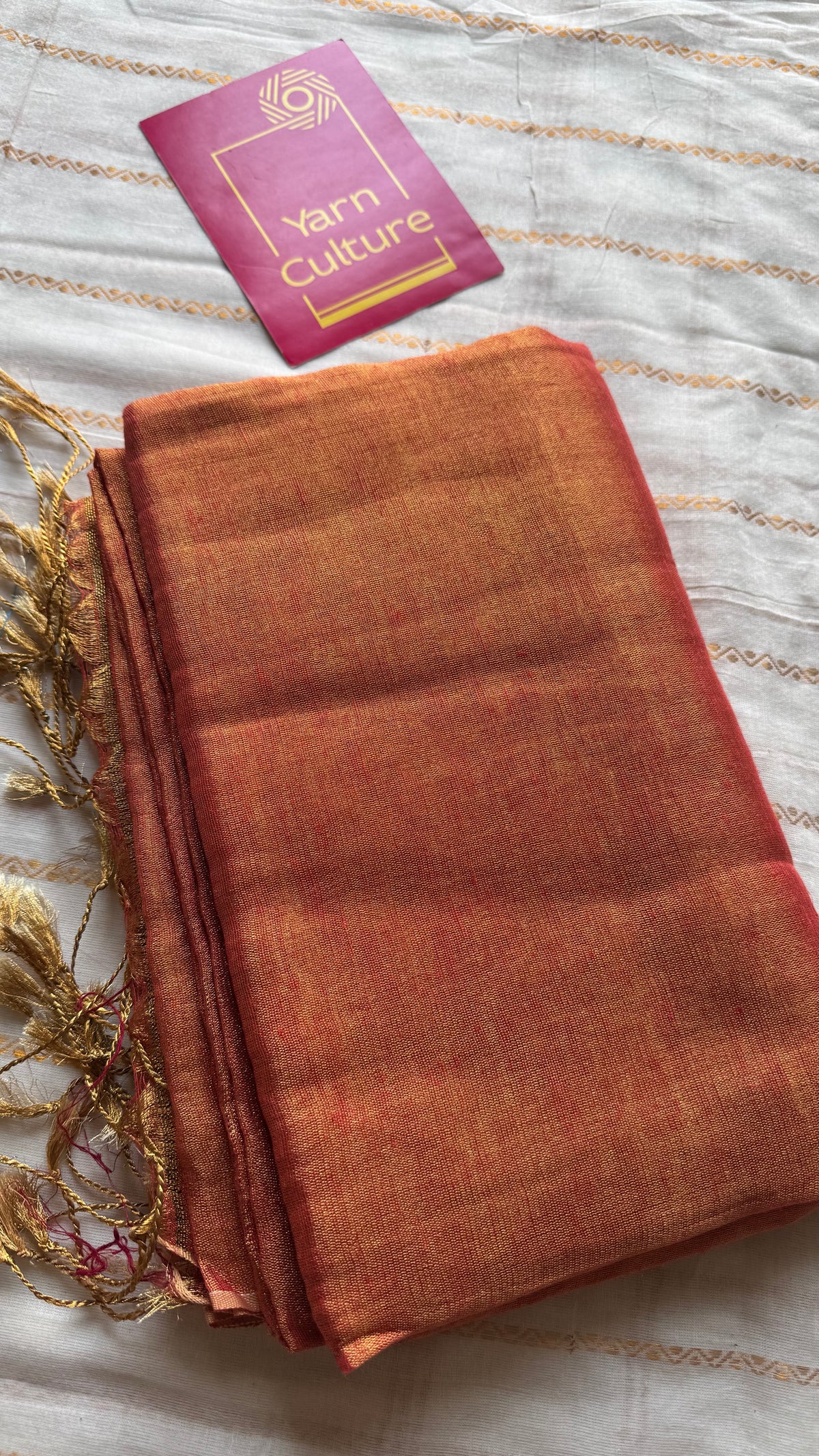 Orange with gold, dual tone metallic tissue linen saree - YCBCLTOC58