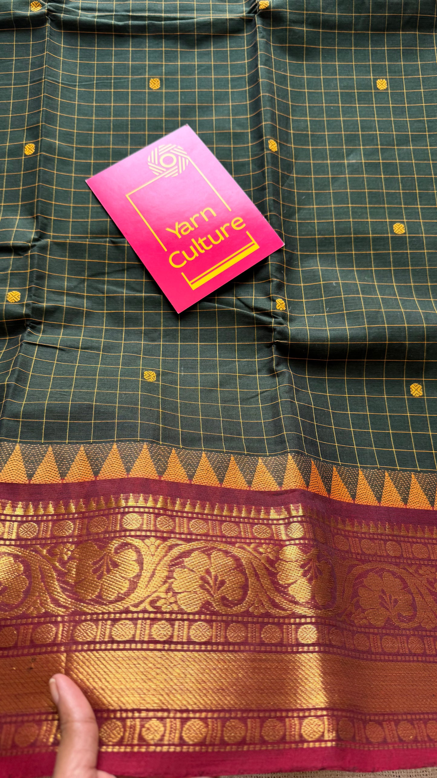 Dark green Kanchi cotton saree with checks, woven buttas and red zari border - YCCOTNCCFE161