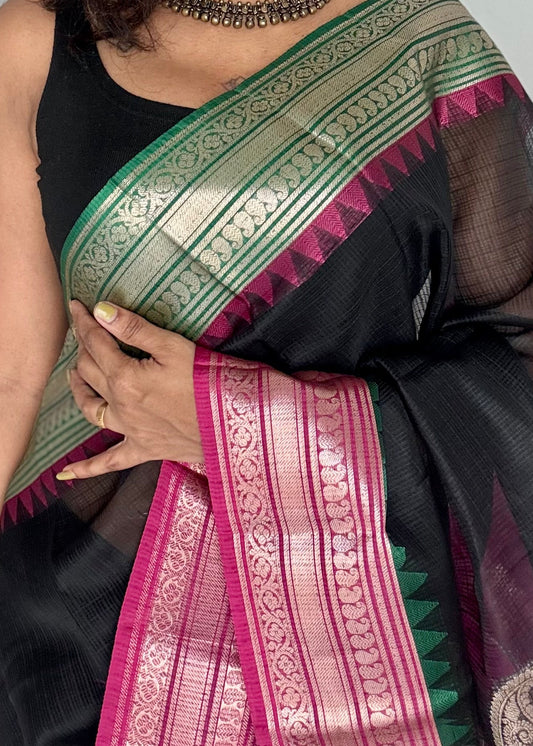 Black Kota Doria saree with magenta and green contrast zari borders Yarn culture

lightweight kota doria saree 

breathable kota doria saree for everyday wear