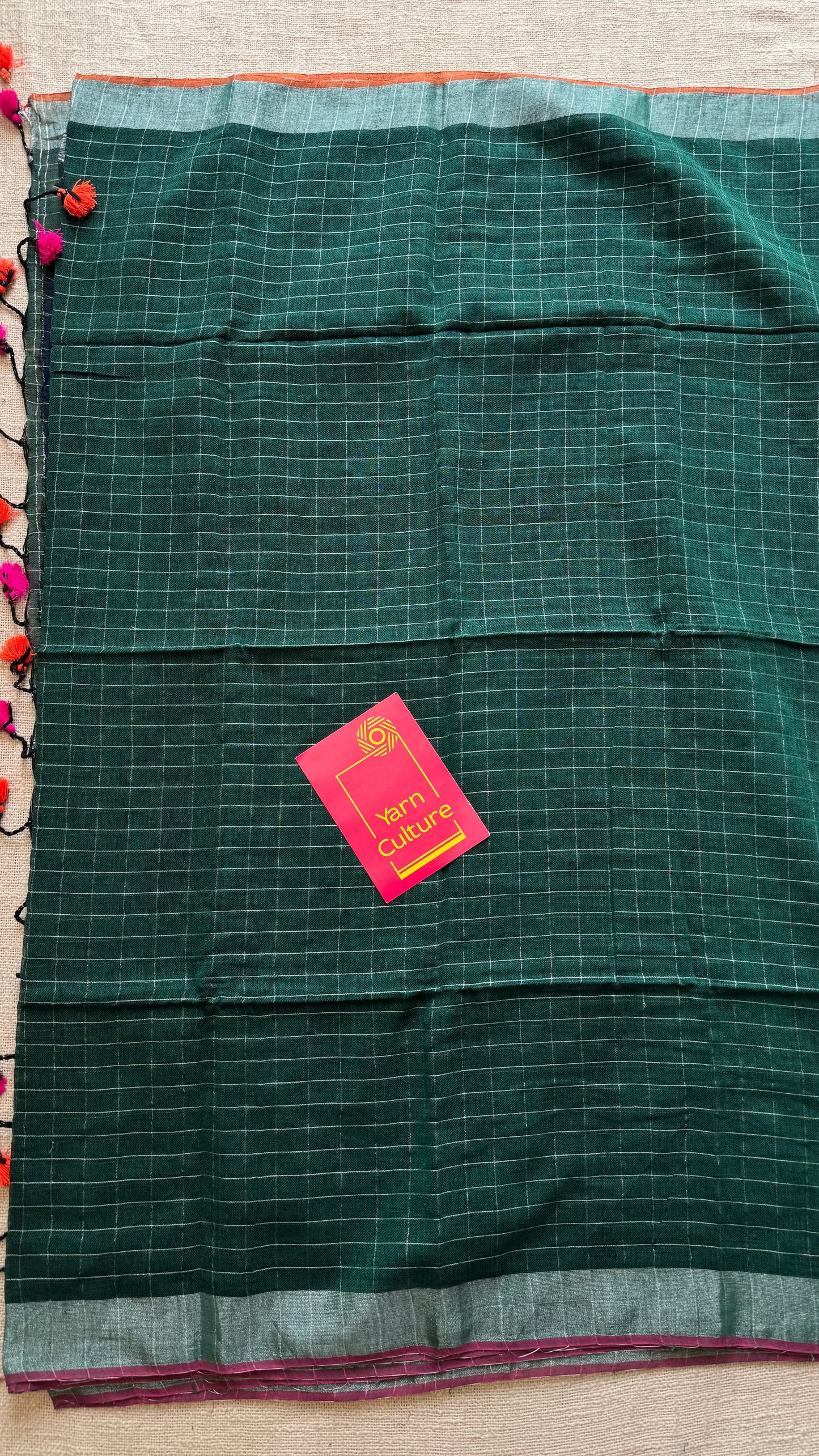 Green linen by cotton saree, silver checks & zari pallu - YCBCLCFE390