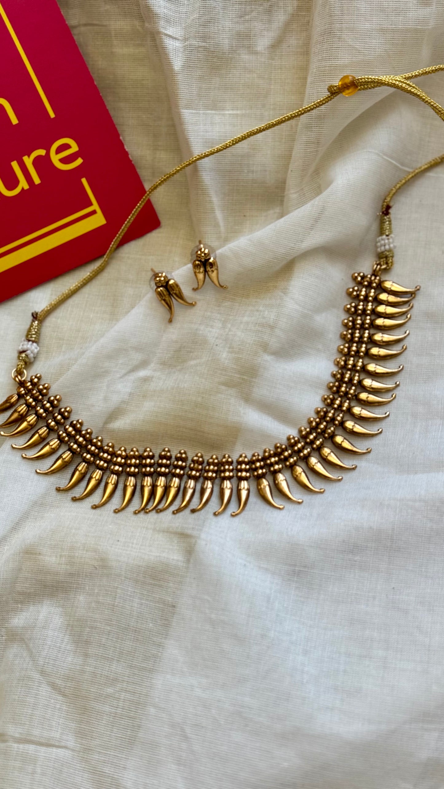 Matte finished mullamottu (bud shaped) neckpiece with earrings - YCGPNP679