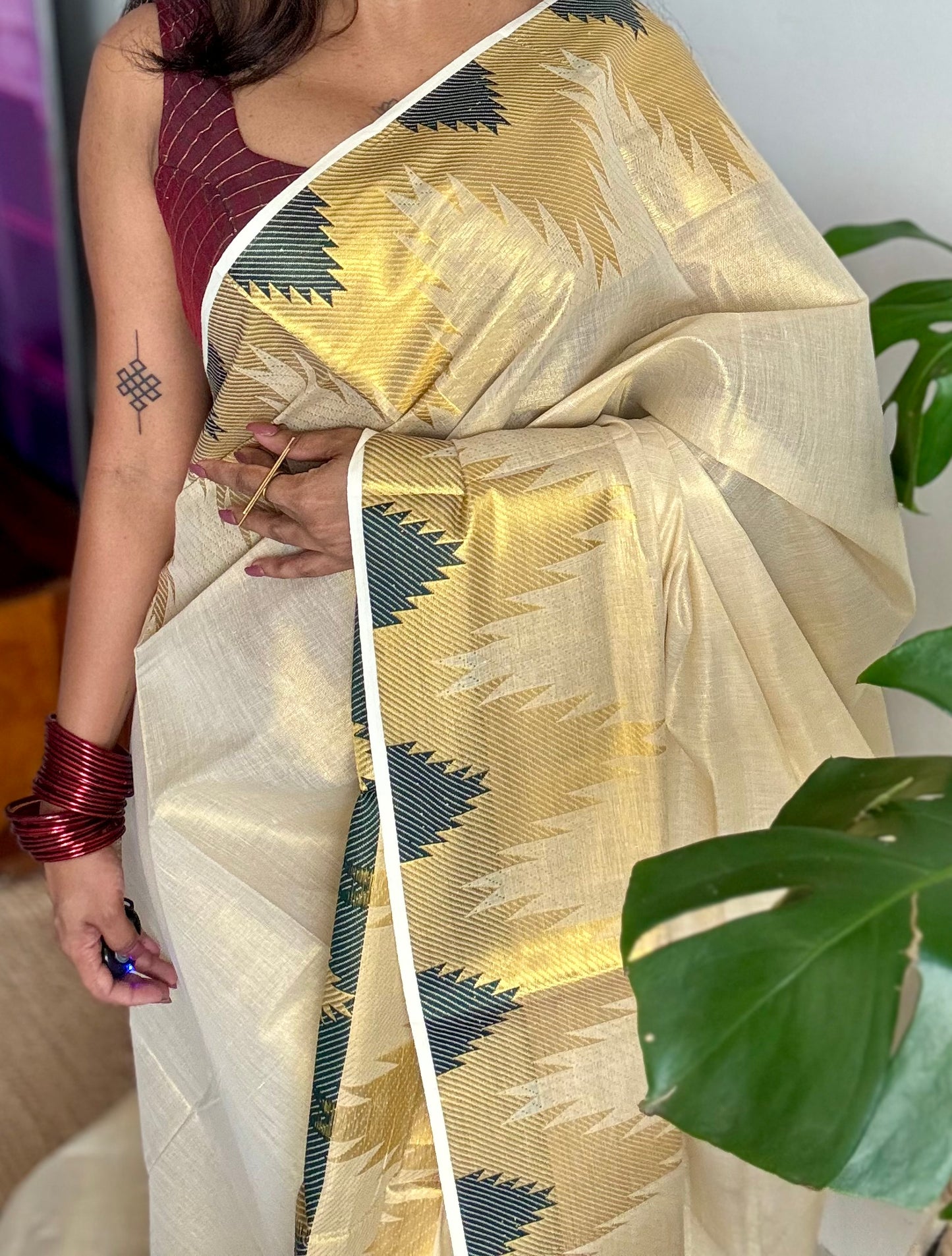 Ivory and gold kerala kasavu saree, dark green temple border - YCIEON47