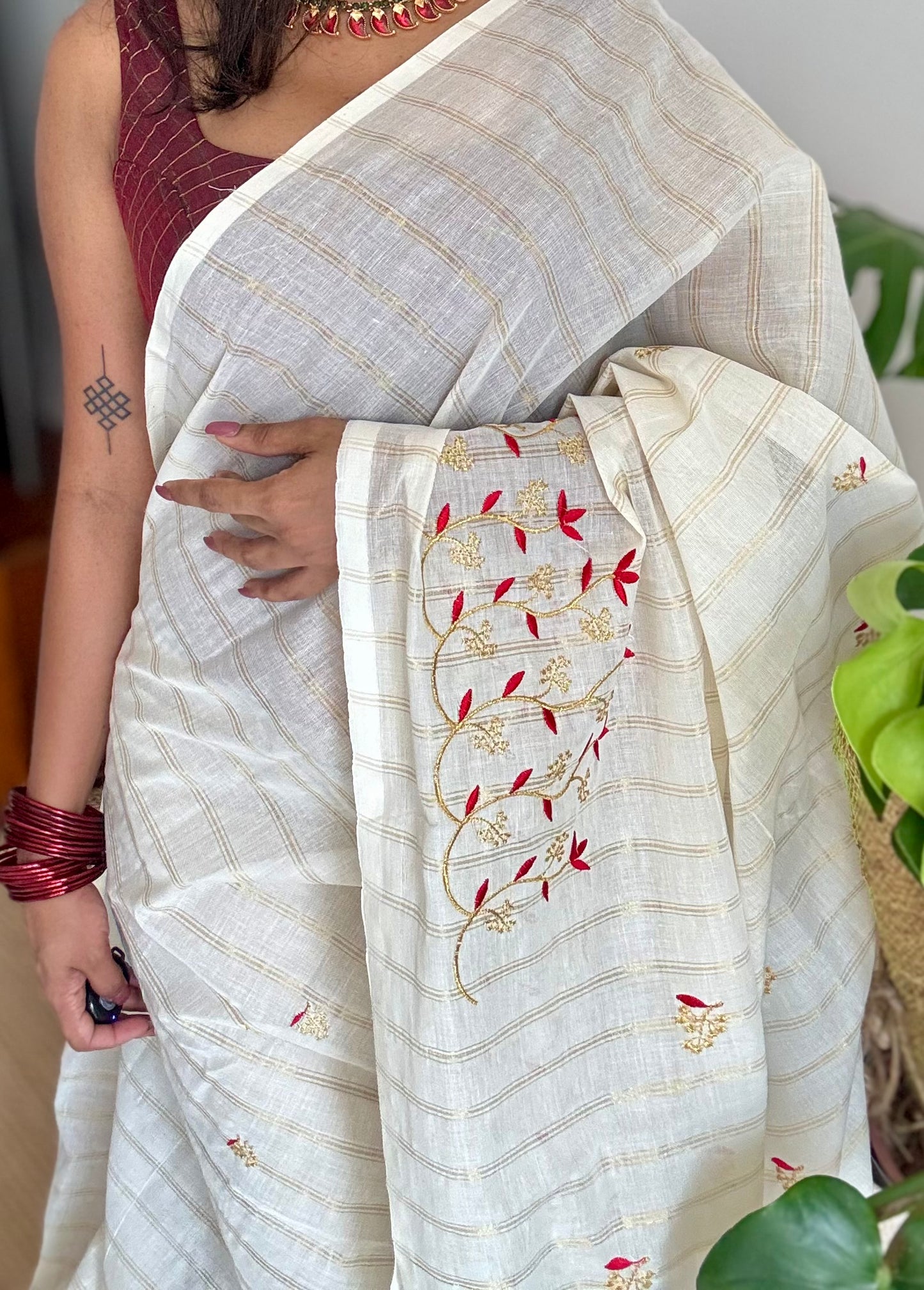 Ivory and gold soft cotton saree, red floral vine embroidery - YCIEON60