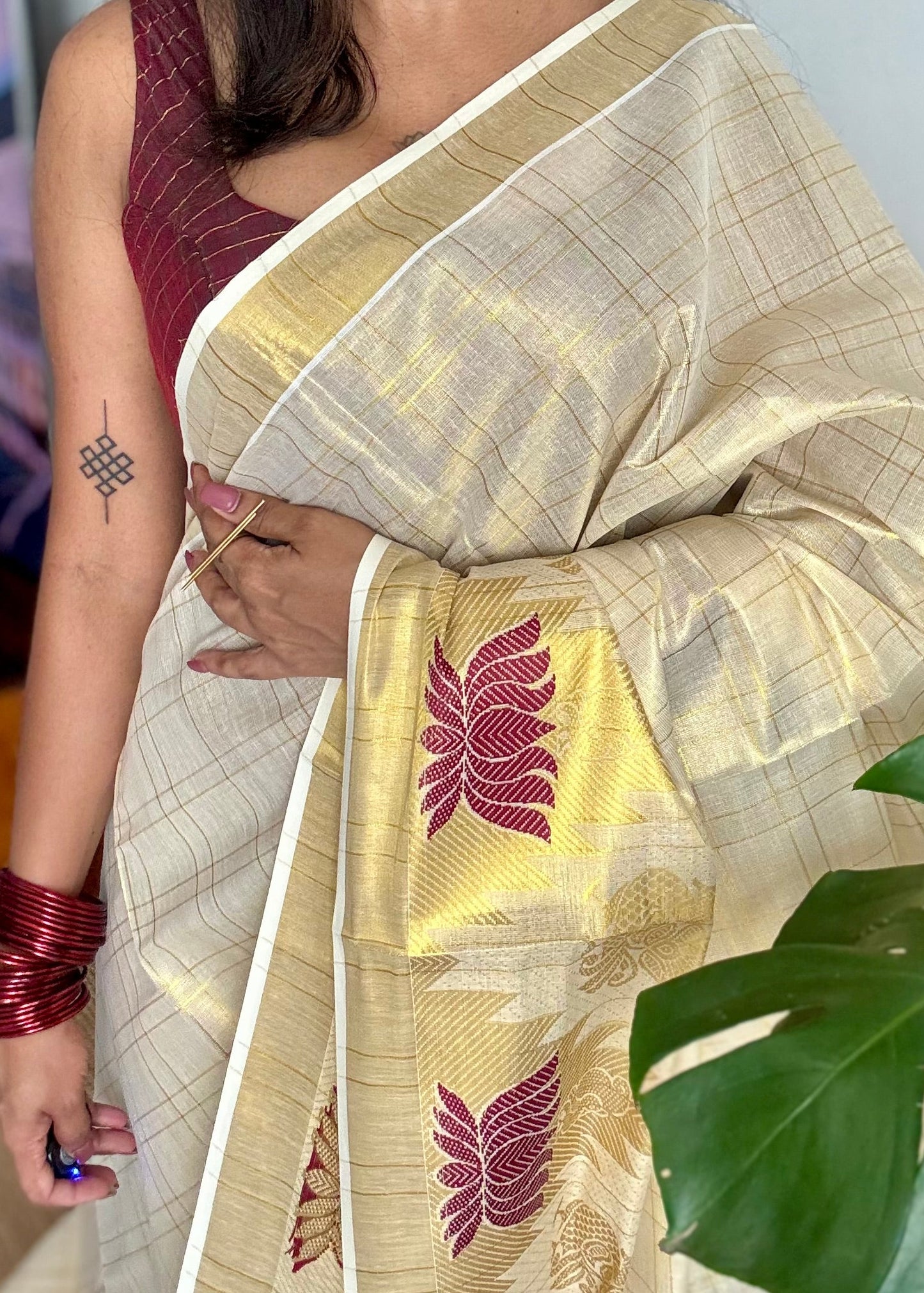Ivory and gold kerala kasavu saree, maroon lotus motif border - YCIEON48