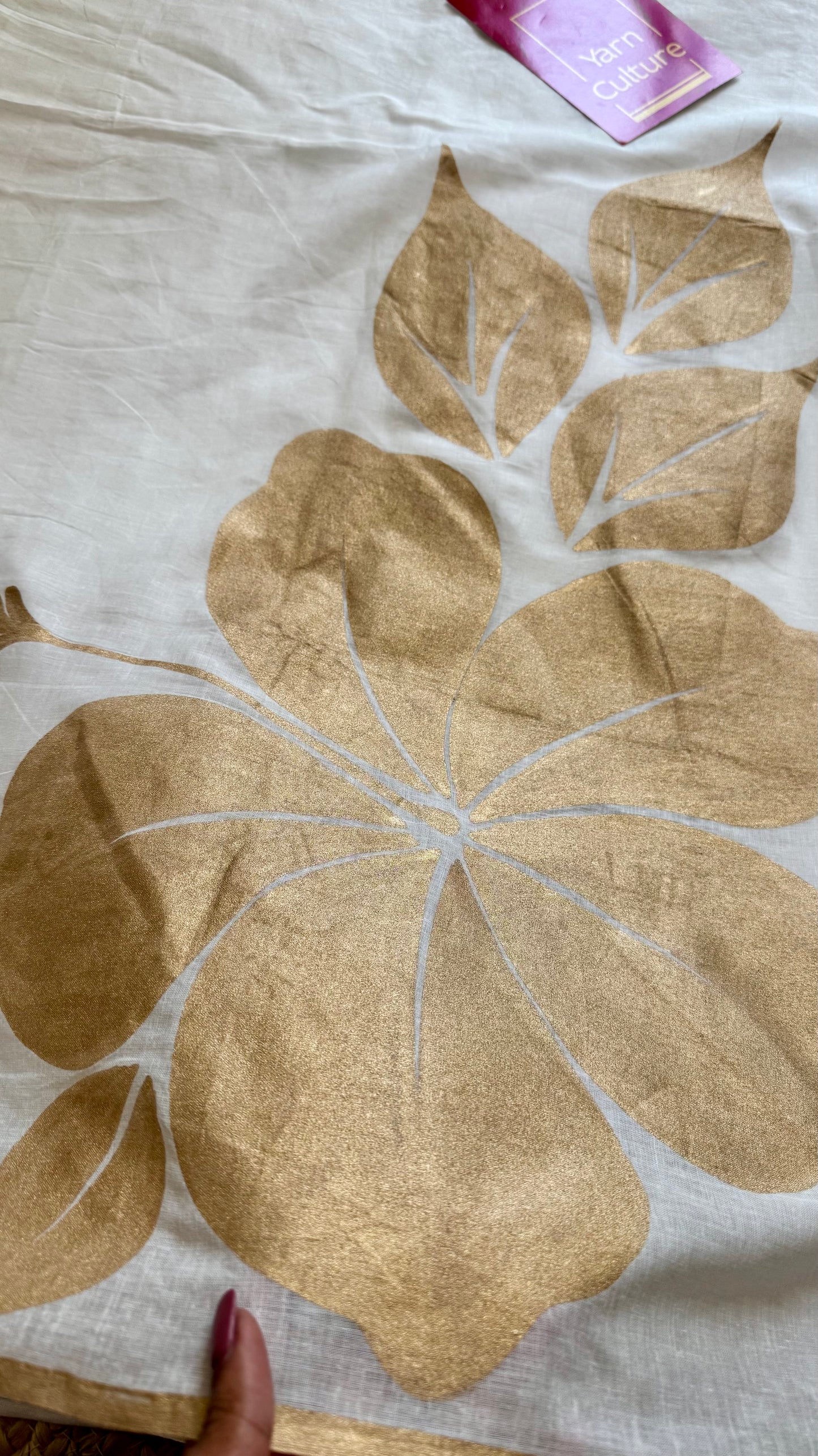 Ivory mul saree, statement floral painted pallu - YCIEON35
