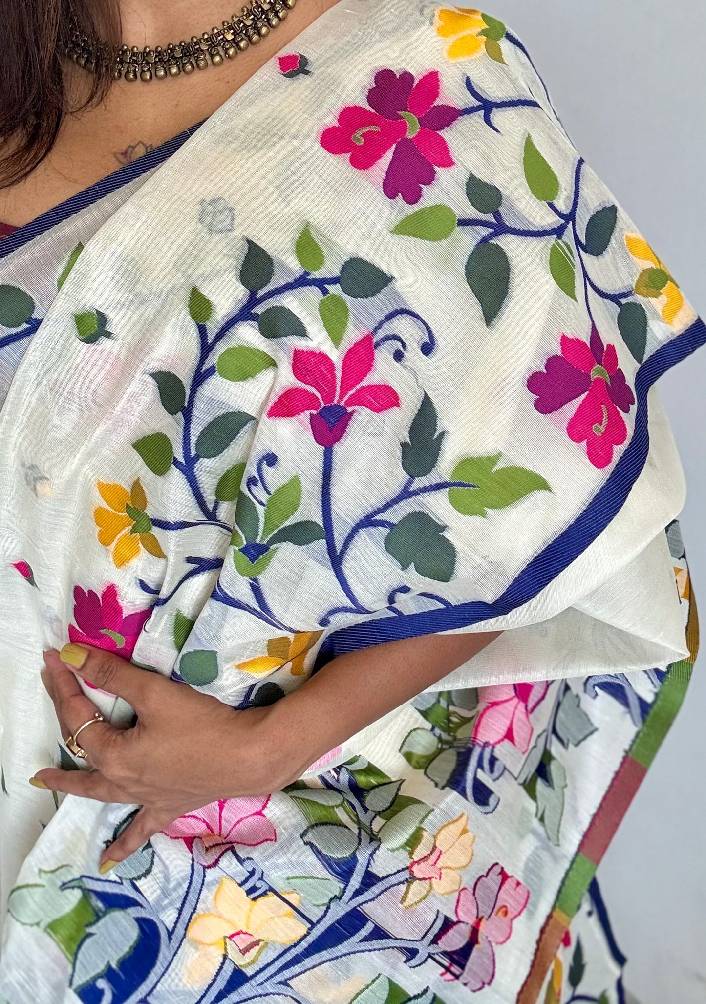 Ivory with navy blue border and multicolour floral motifs, cotton saree - YCIEBCFE325