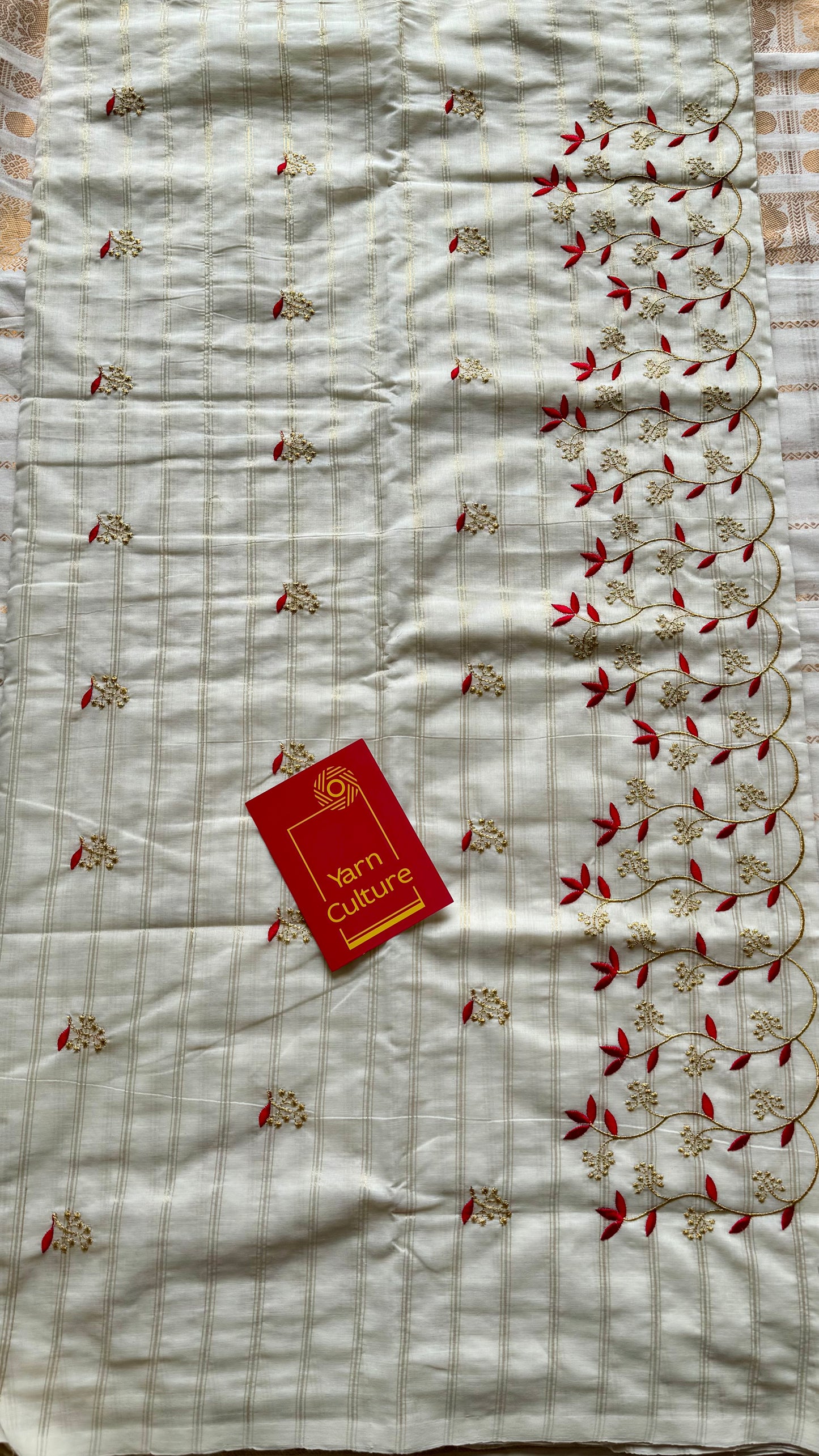 Ivory and gold soft cotton saree, red floral vine embroidery - YCIEON60