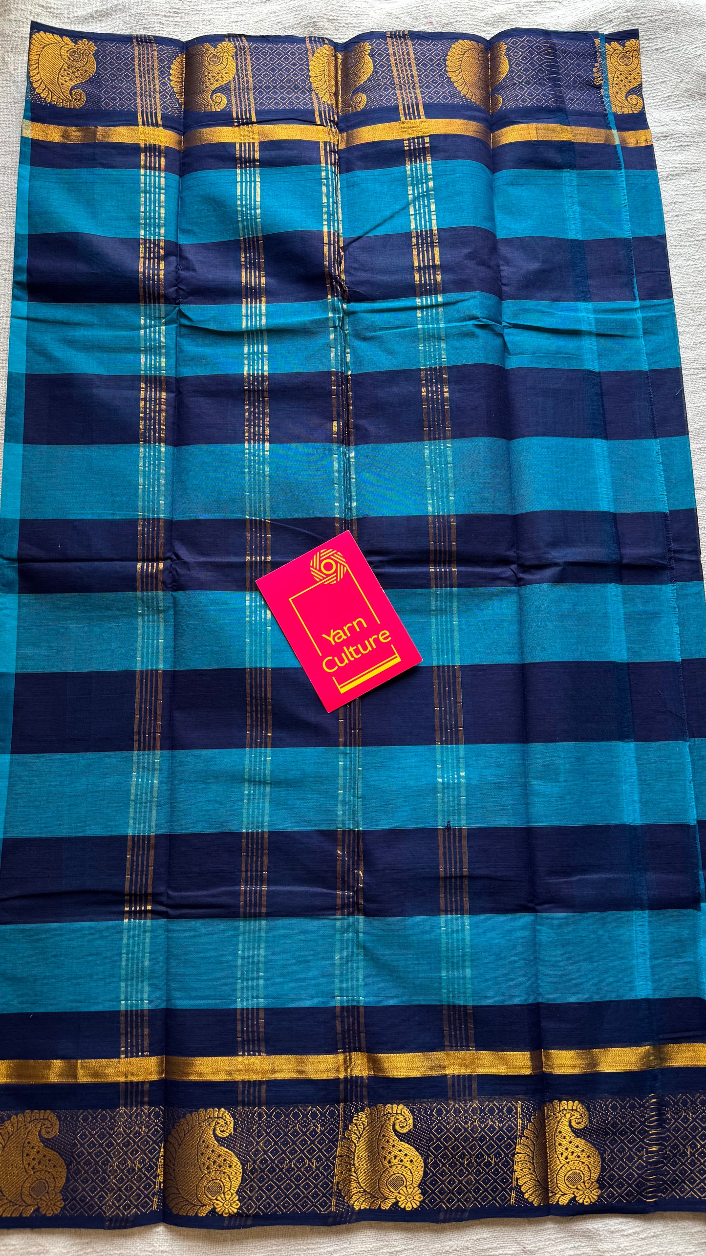 Chettinad cotton saree with sky blue and navy checks, paisley motif border - YCCOTNAP62